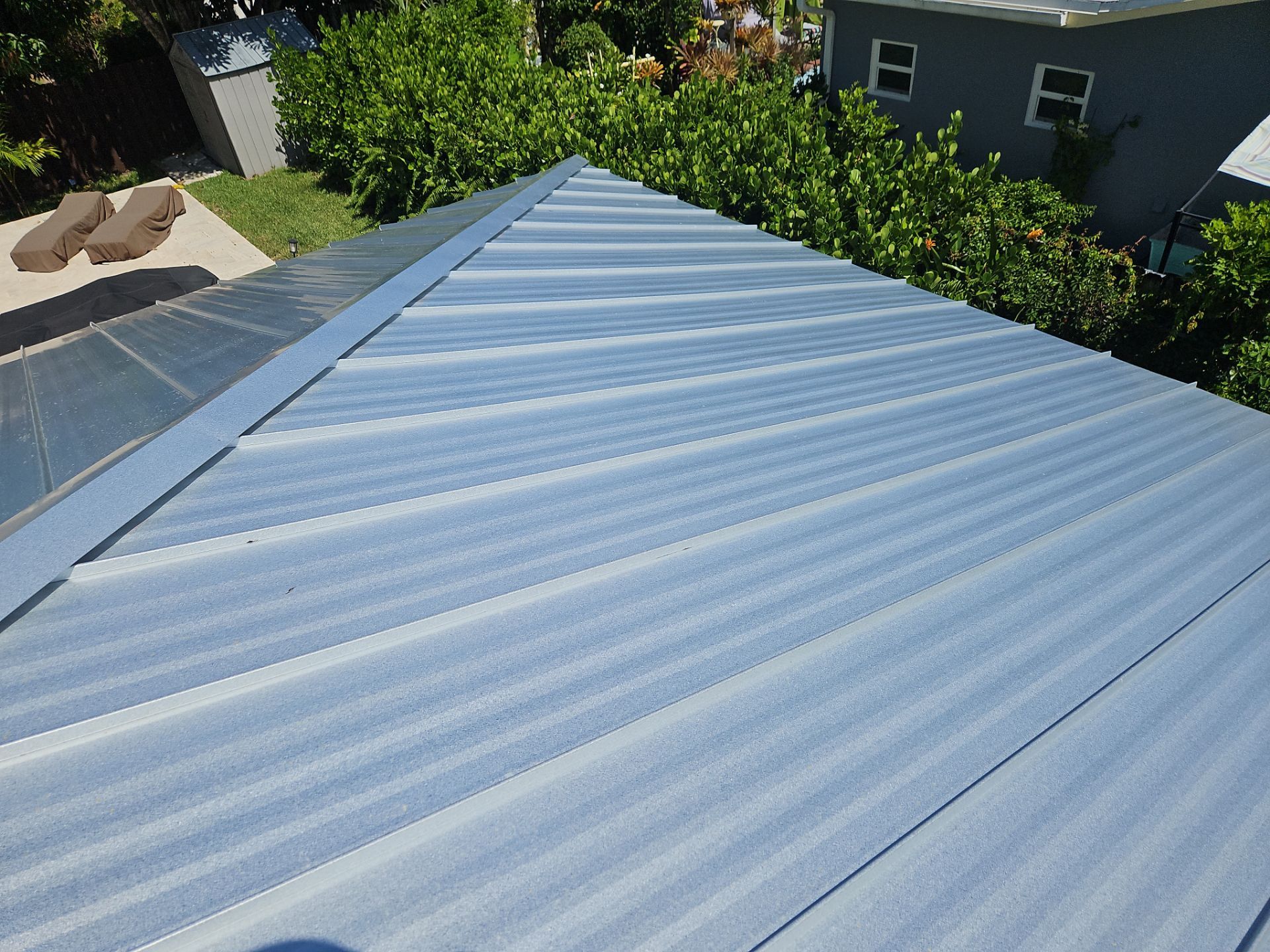 Residential Roofing Installation using 1" Nail strip metal roof by BLUES BROTHERS ROOFING