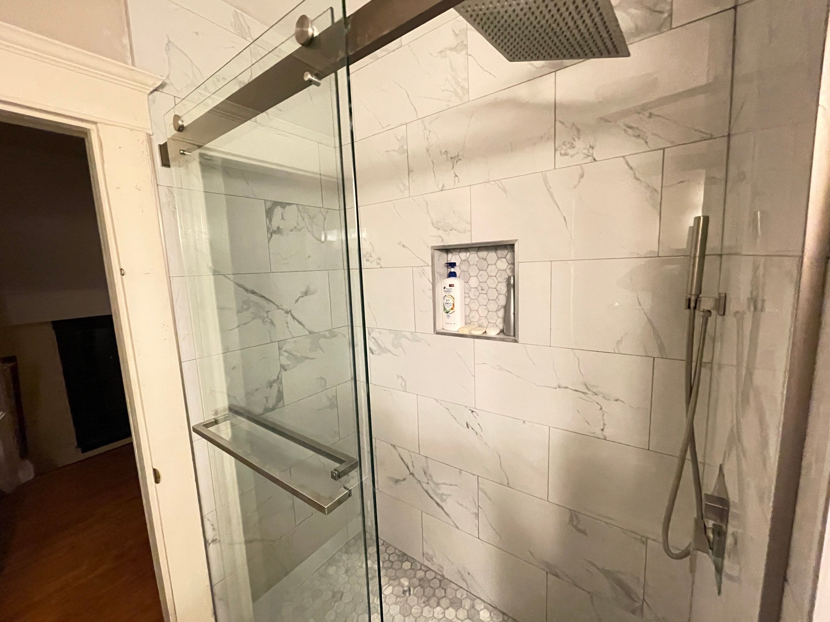 Bathroom Remodel using Tile by Home Concepts Construction