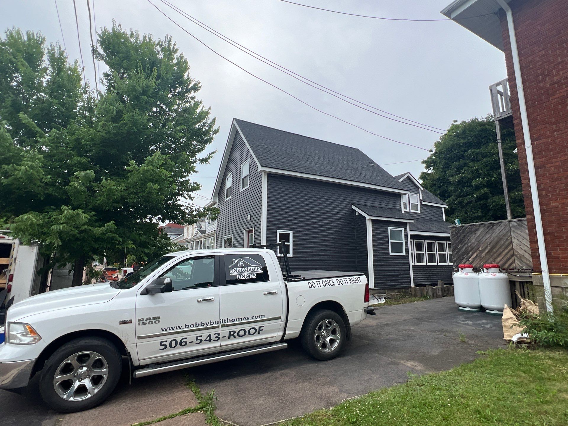 Exterior Renovation using New Roofing and Siding by Bobby Built