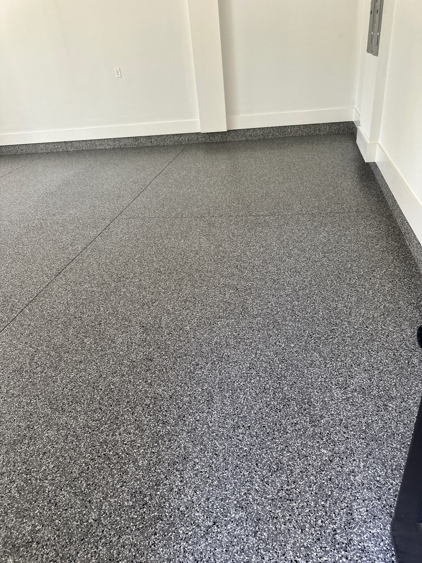 Garage Floor Coating using Wombat by My Garage Floor Guys