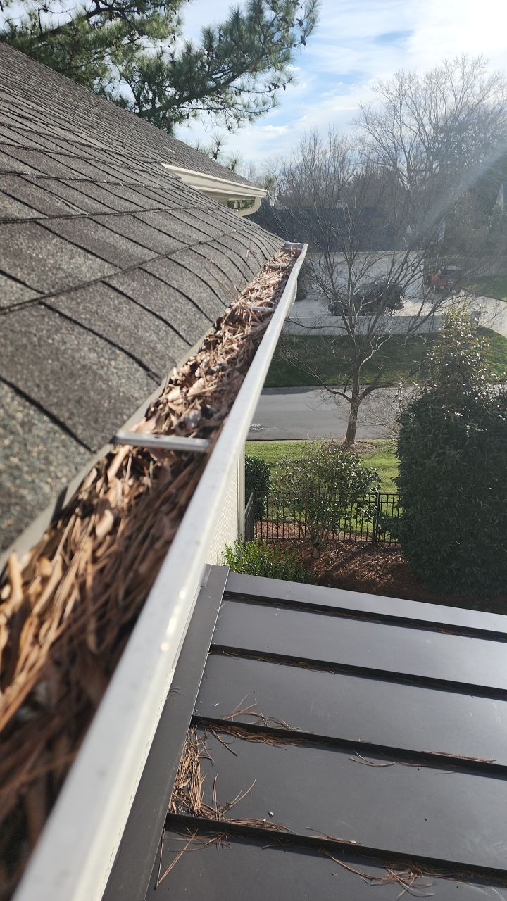 Gutter Cleaning using water by Power Wash Masters LLC