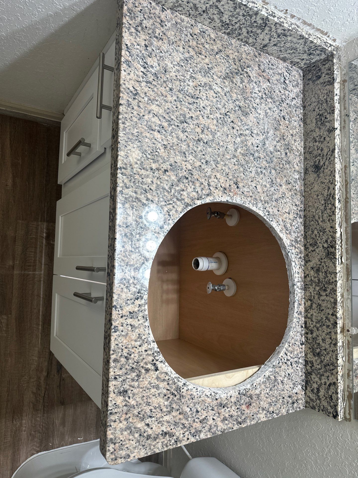 Granite Bathroom deep stain removal in Mobile by Cornerstone Hard Surface Restoration