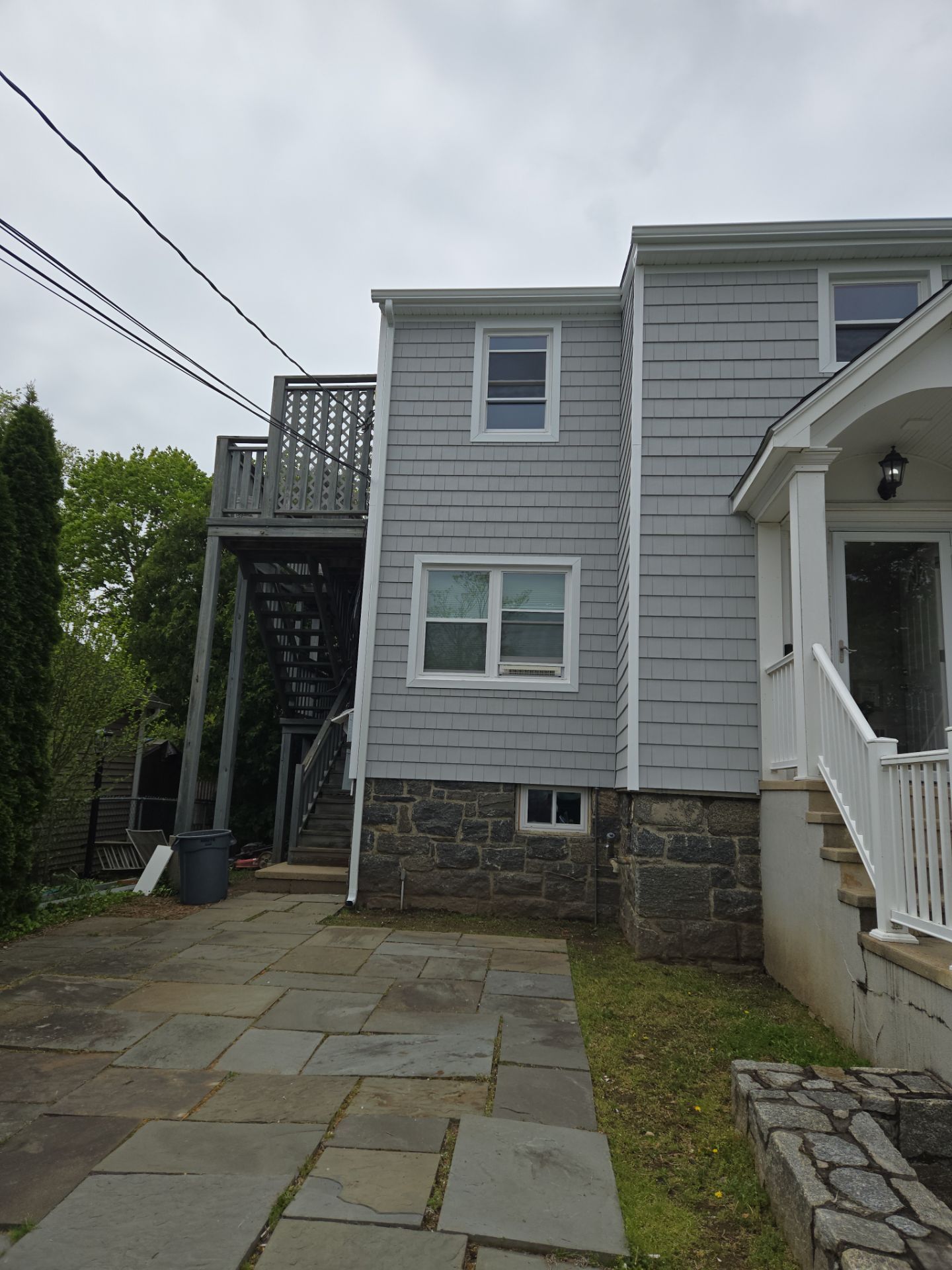 Siding Installation using Certainteed Cedar Impressions Straight Edge Perfection Shingles - D7 - Sterling Gray by A Plus Exterior