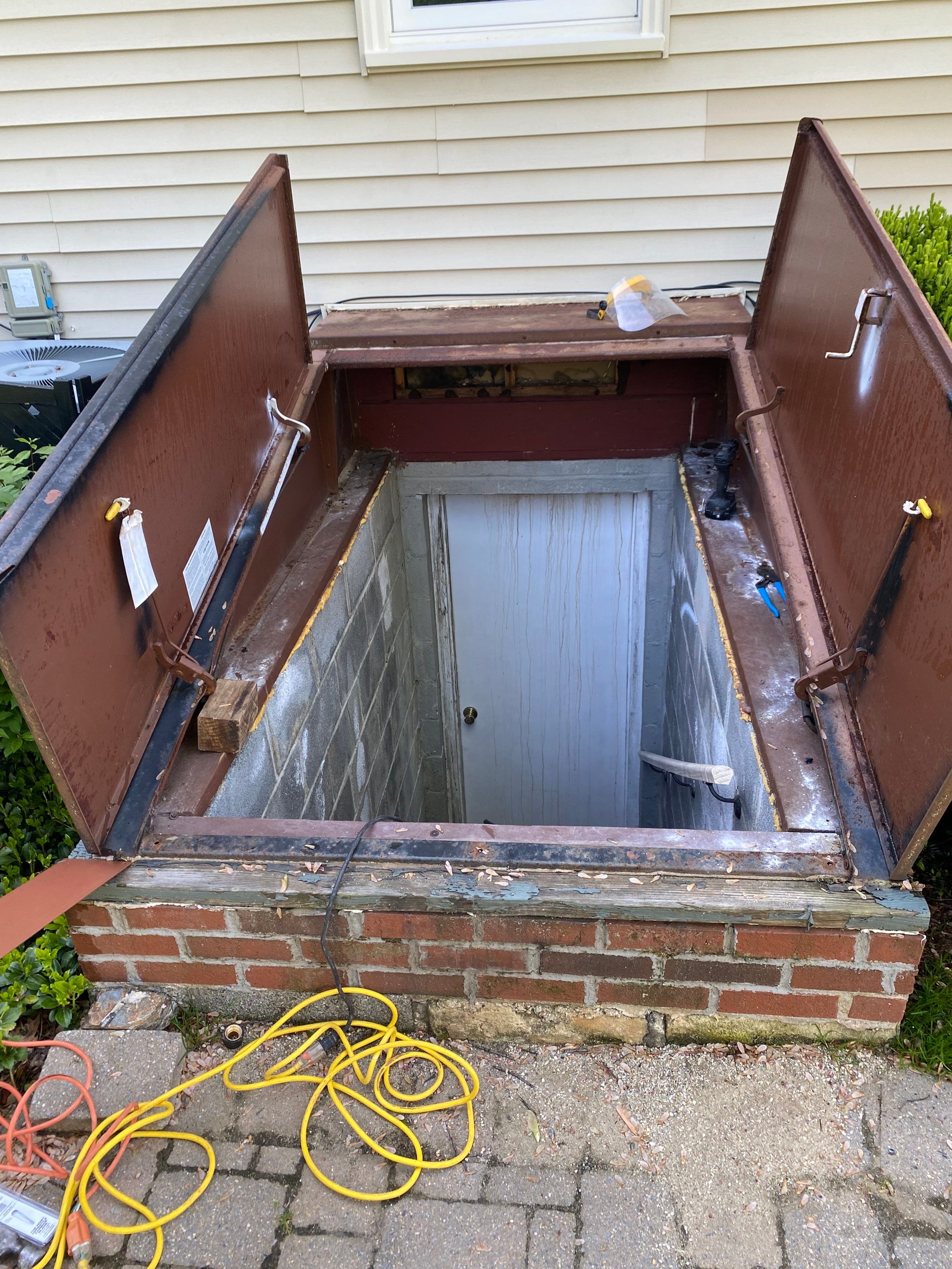 New Bilco doors to basement & new front porch posts by The Smet Companies, LLC