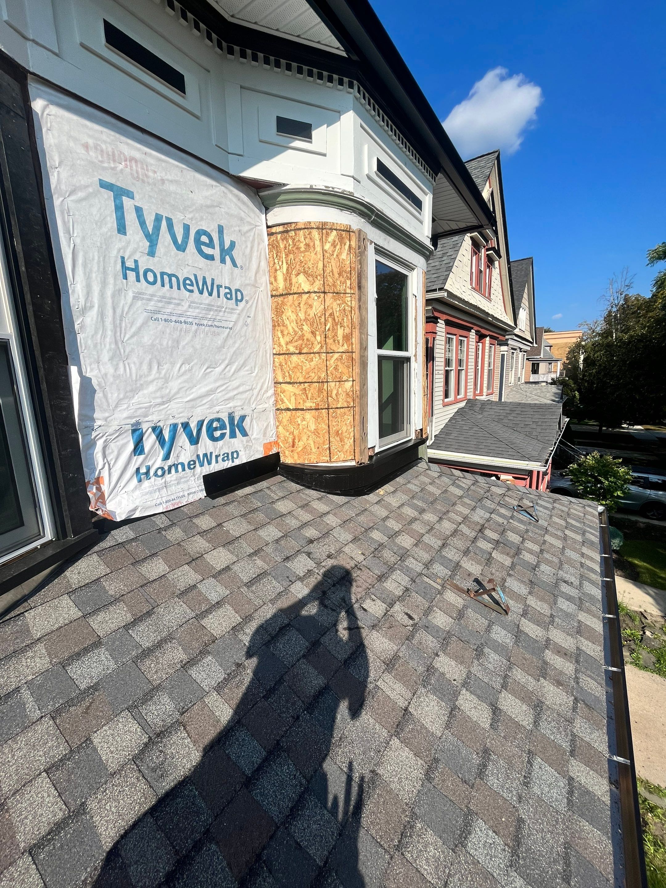 Exterior Renovations- Siding, Stamped Concrete, Porch, and Railings by Ivy Lea Construction