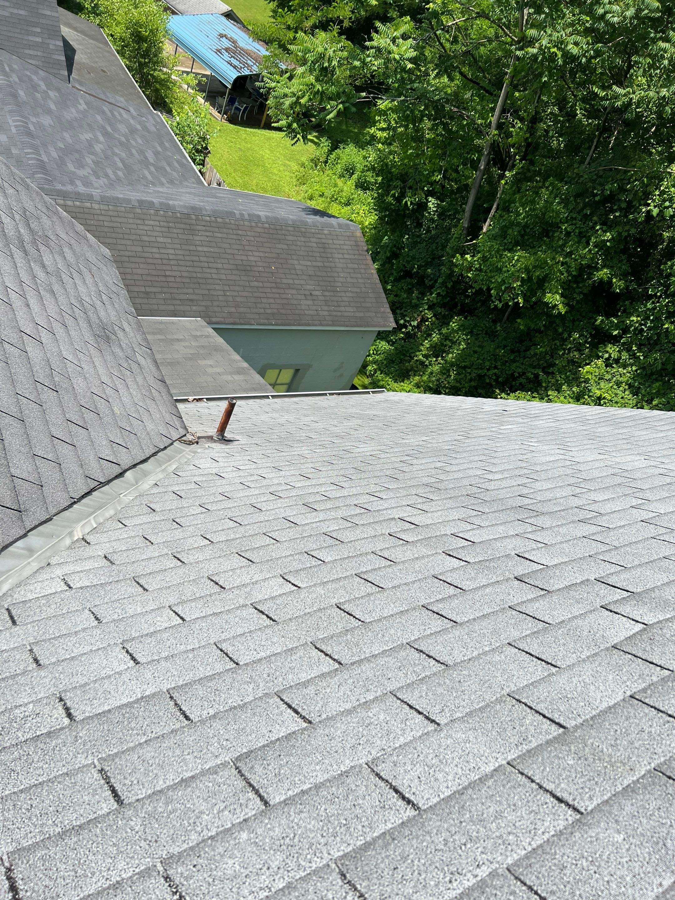 Residential Roofing Installation using Certainteed Landmark Shingles Moire Black Color by Secure Construction Company Inc