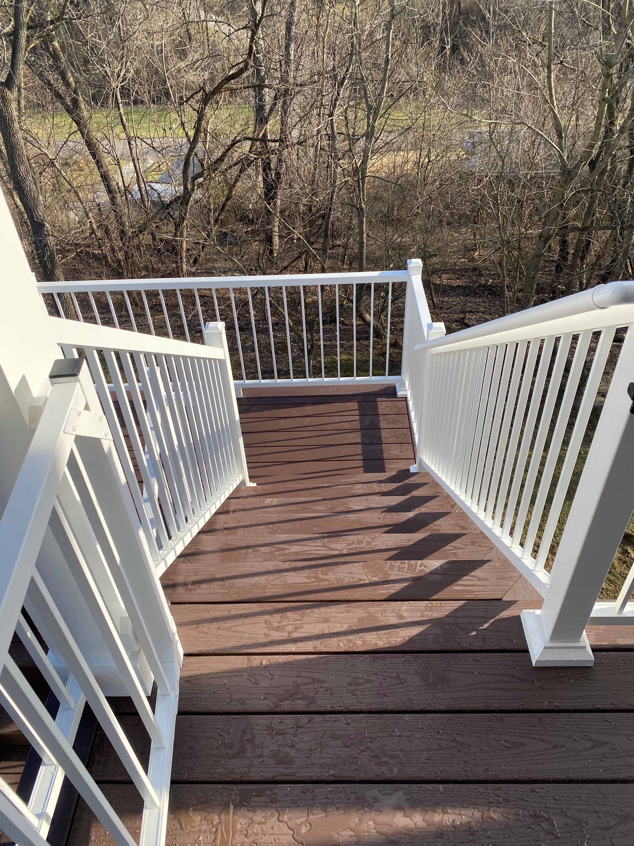 Deck and Roof Build by Cousins Roofing Siding & Decks