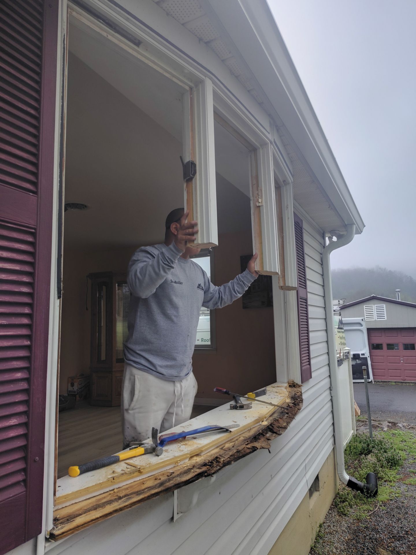 Entry Door with sidelite and storm door and bow by Aspen Home Improvements