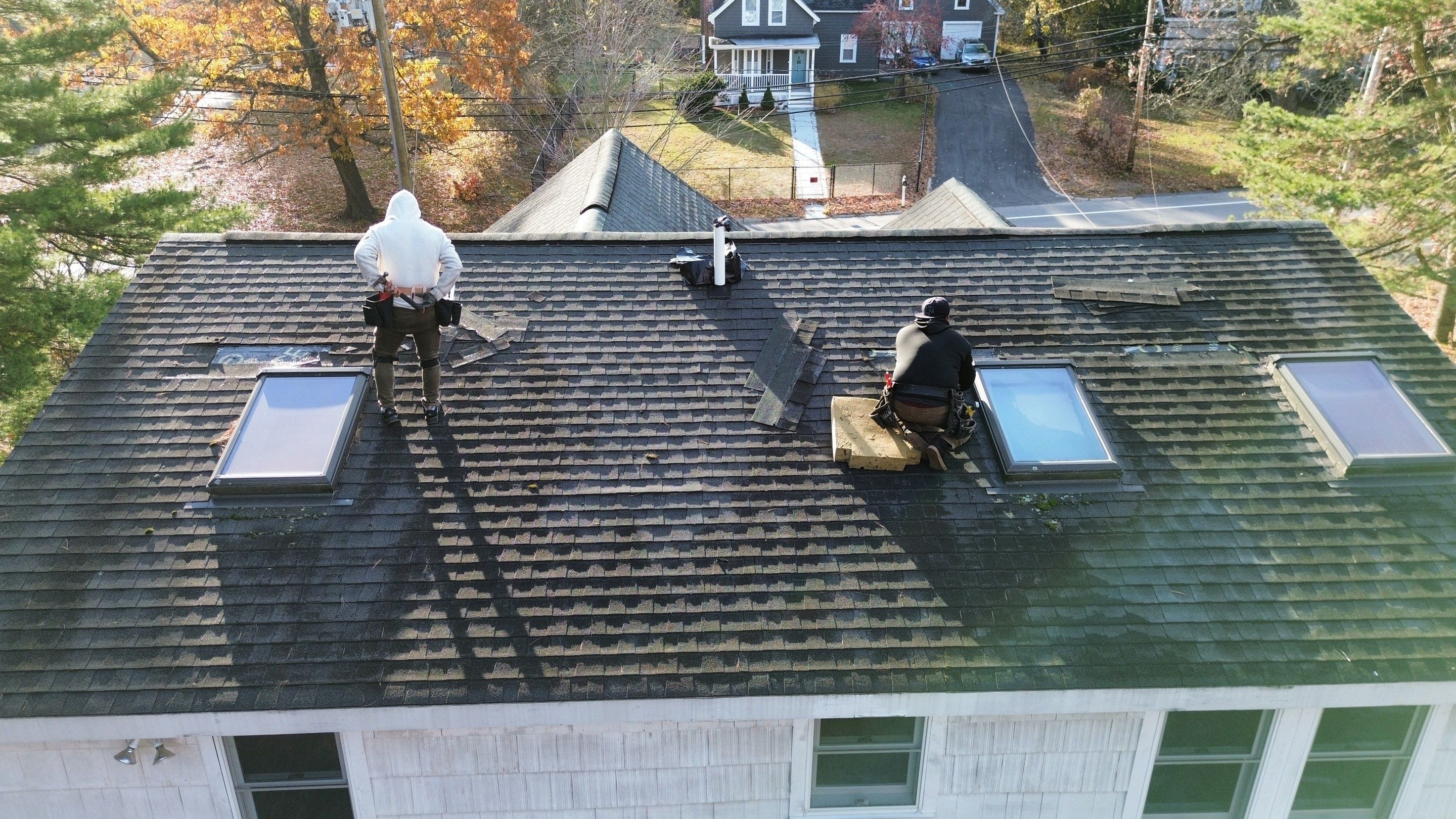 Chelmsford Triple Skylight Leak Repair with Fascia & Shingle Restoration by Mighty Dog Roofing of Greater Middlesex County
