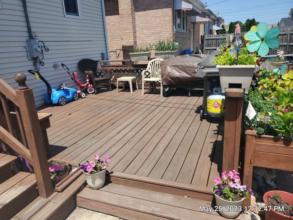 Wood cleaning and staining using Armstrong cloark oil stain by Northern Power Washing LLC.