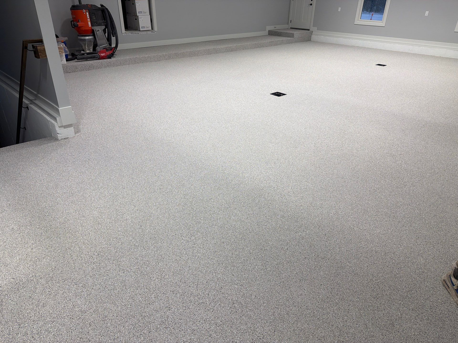 Garage & Basement Epoxy Floor Coating | Whitehall, Michigan by Gordon Painting