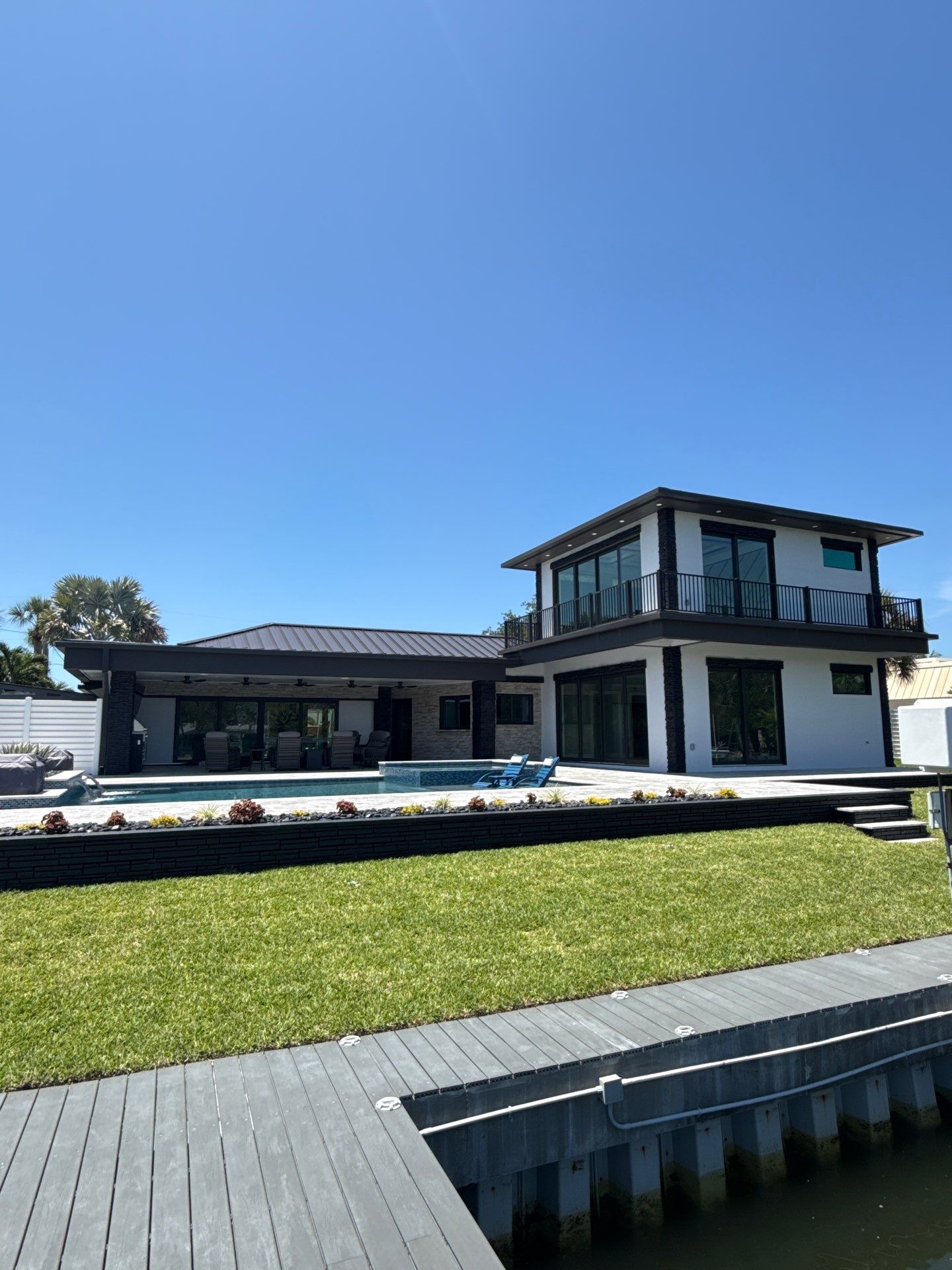 7-Inch Smooth Box Seamless Gutters using black seamless gutters in Siesta Key Fl by Gutter Professors
