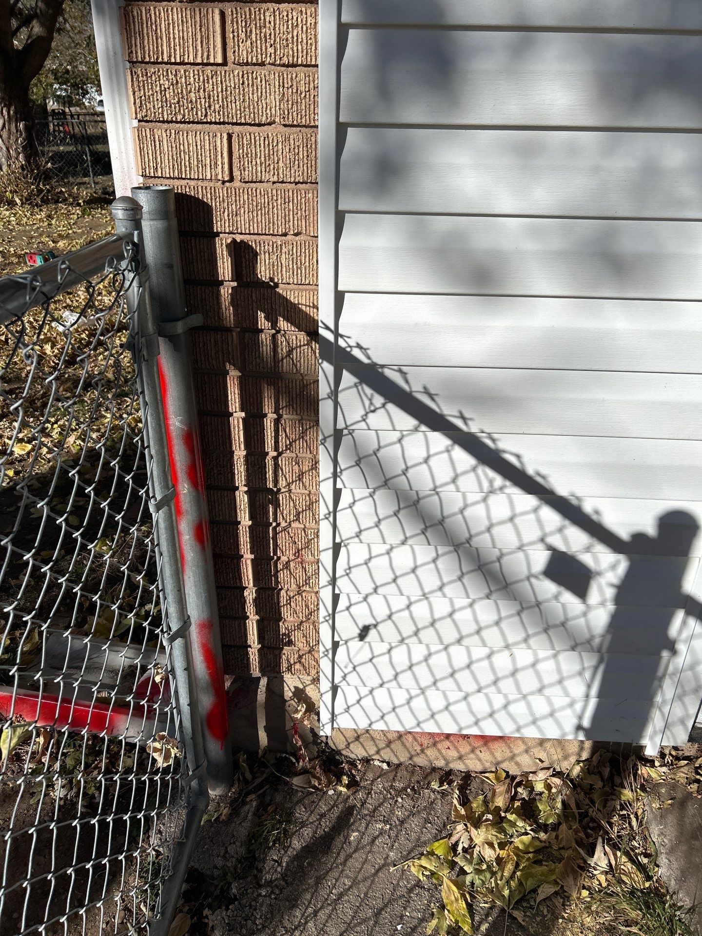 Salt Lake Area | Targeted Vinyl Siding & Door Trim Repair | Crisp White by Ideal Siding Utah