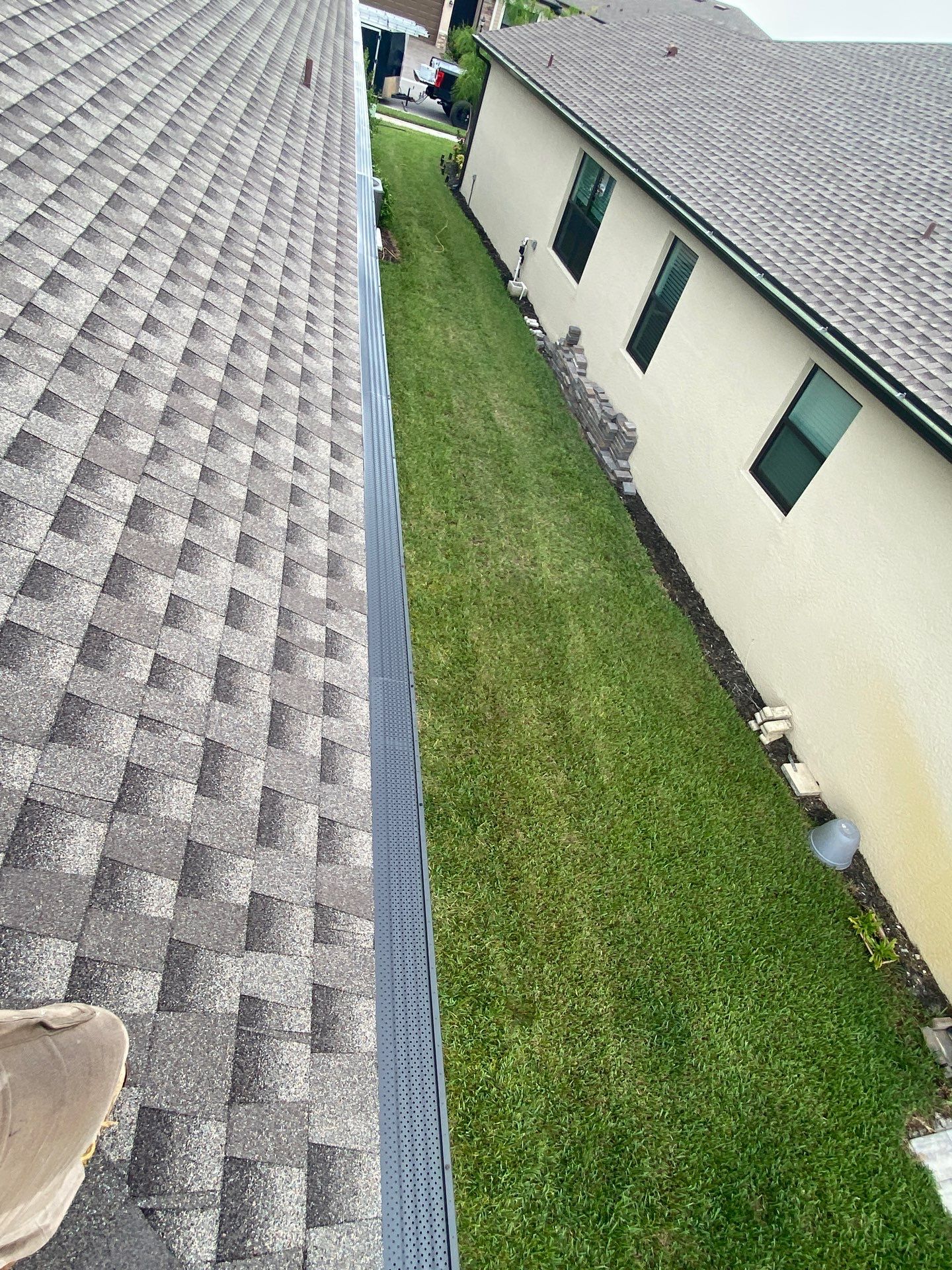 Brown Seamless Gutters for Homes in Fort Myers by Gutter Professors