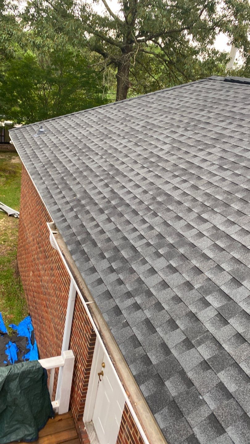 Residential Roofing Installation using Roof Replacement by American Roofing & Construction LLC