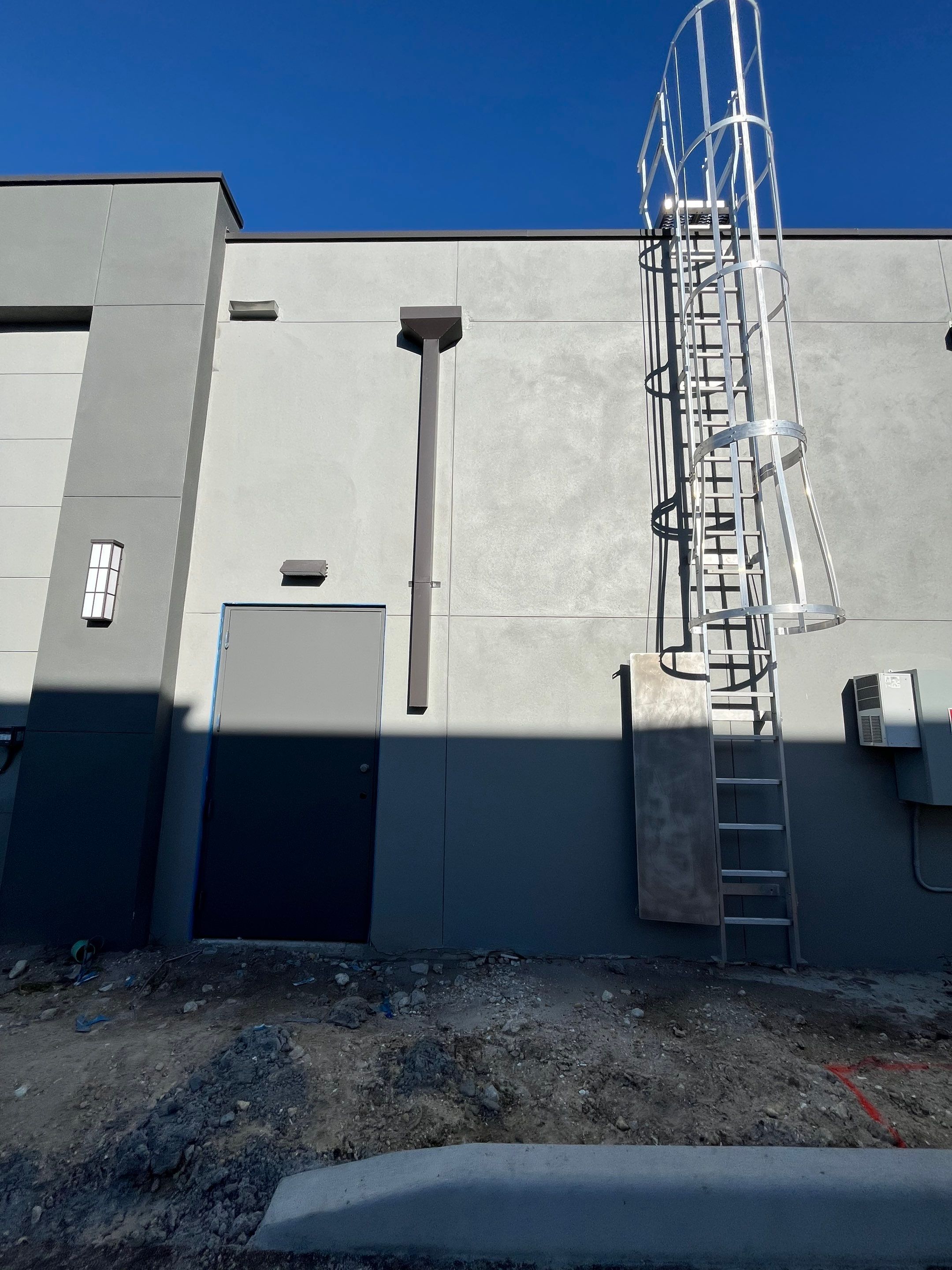 Downspout Installation using collector head in Cape Coral FL by Gutter Professors