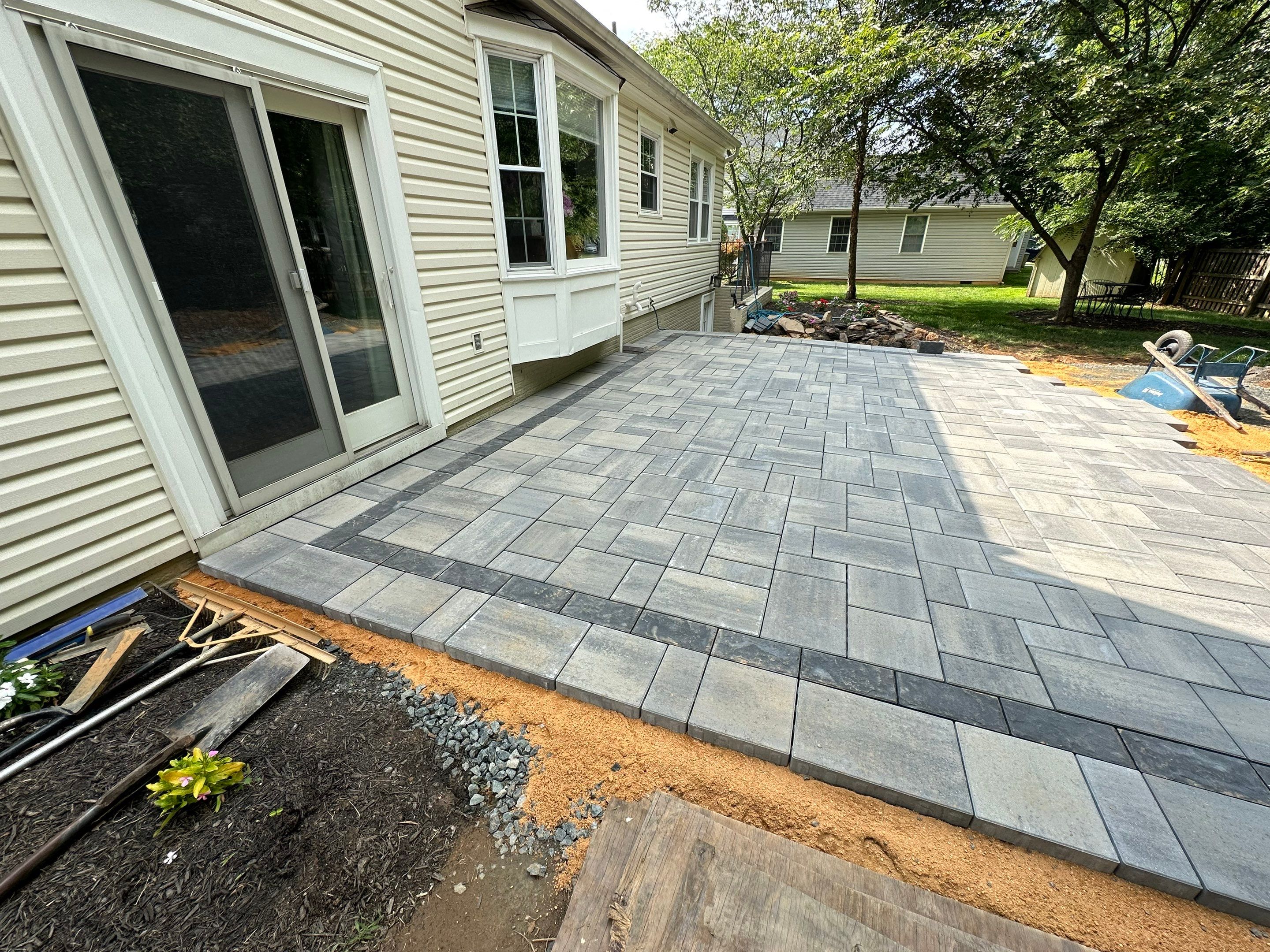 Backyard Transformation using Techo-Bloc Pavers by The Smet Companies, LLC