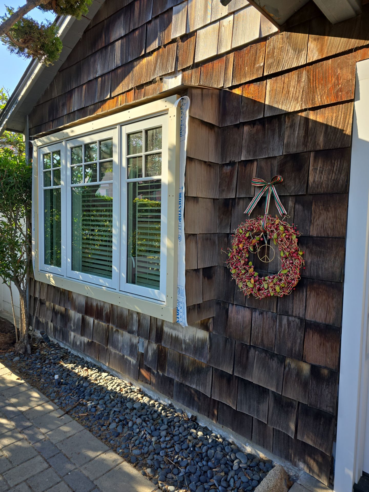 Pre-finish shingles by New Era Siding Inc 