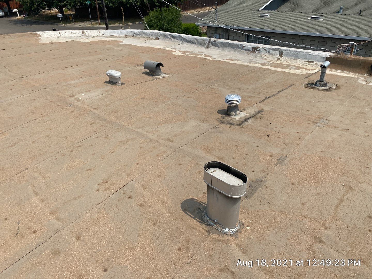 Residential Roofing Installation using Spray foam roofing insulation and General Coatings acrylic coatings by Straight Edge Roofing Inc