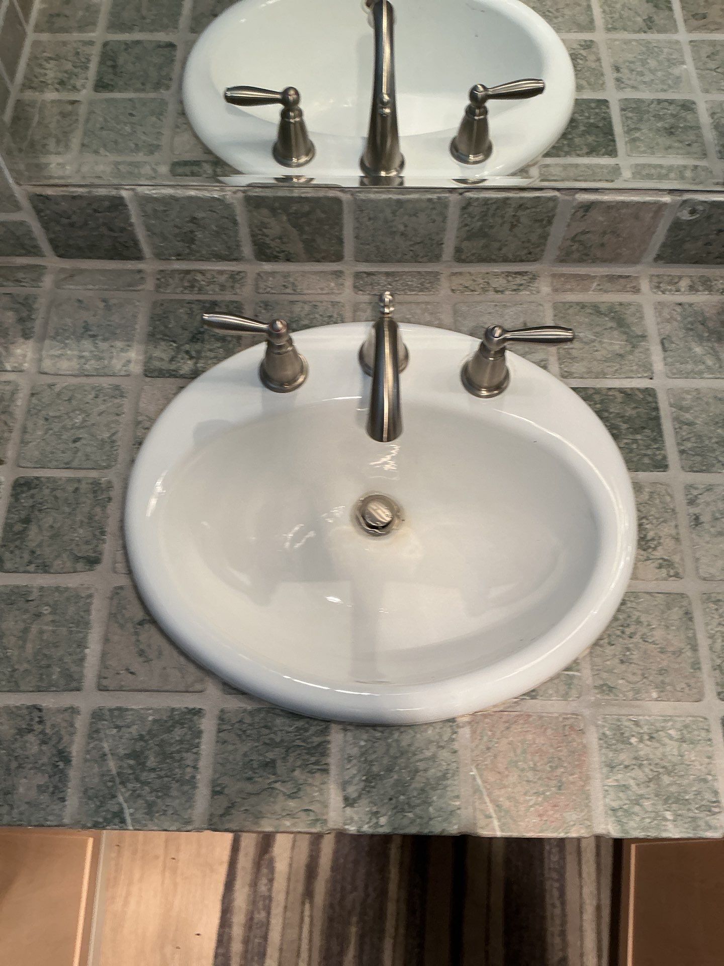 Moen Faucets Installed & Tankless Flush by P&M Plumbing Inc.