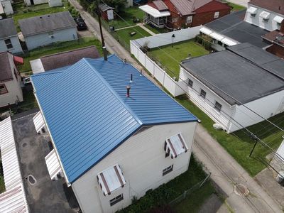 Residential Roofing Installation using Metal