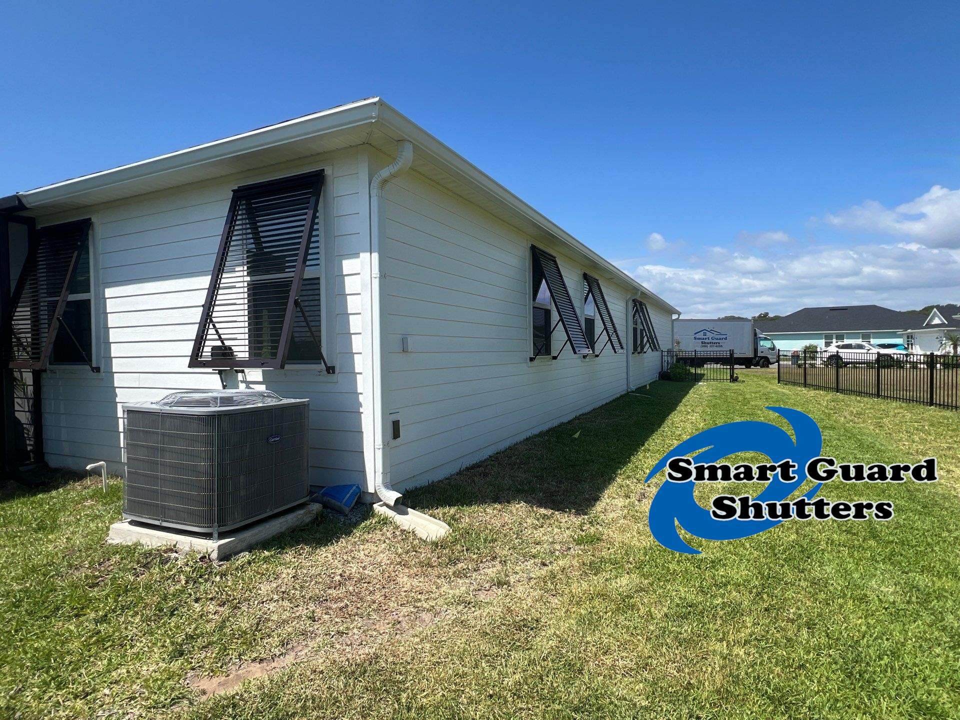 Impact Bahamas In Grey Brown by Smart Guard Shutters