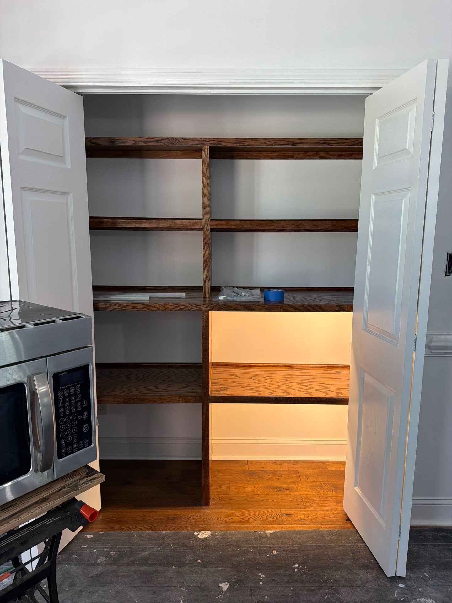 Complete Kitchen Renovation Featuring White Shaker Cabinetry in Fayetteville by Karcher Roofing & Construction