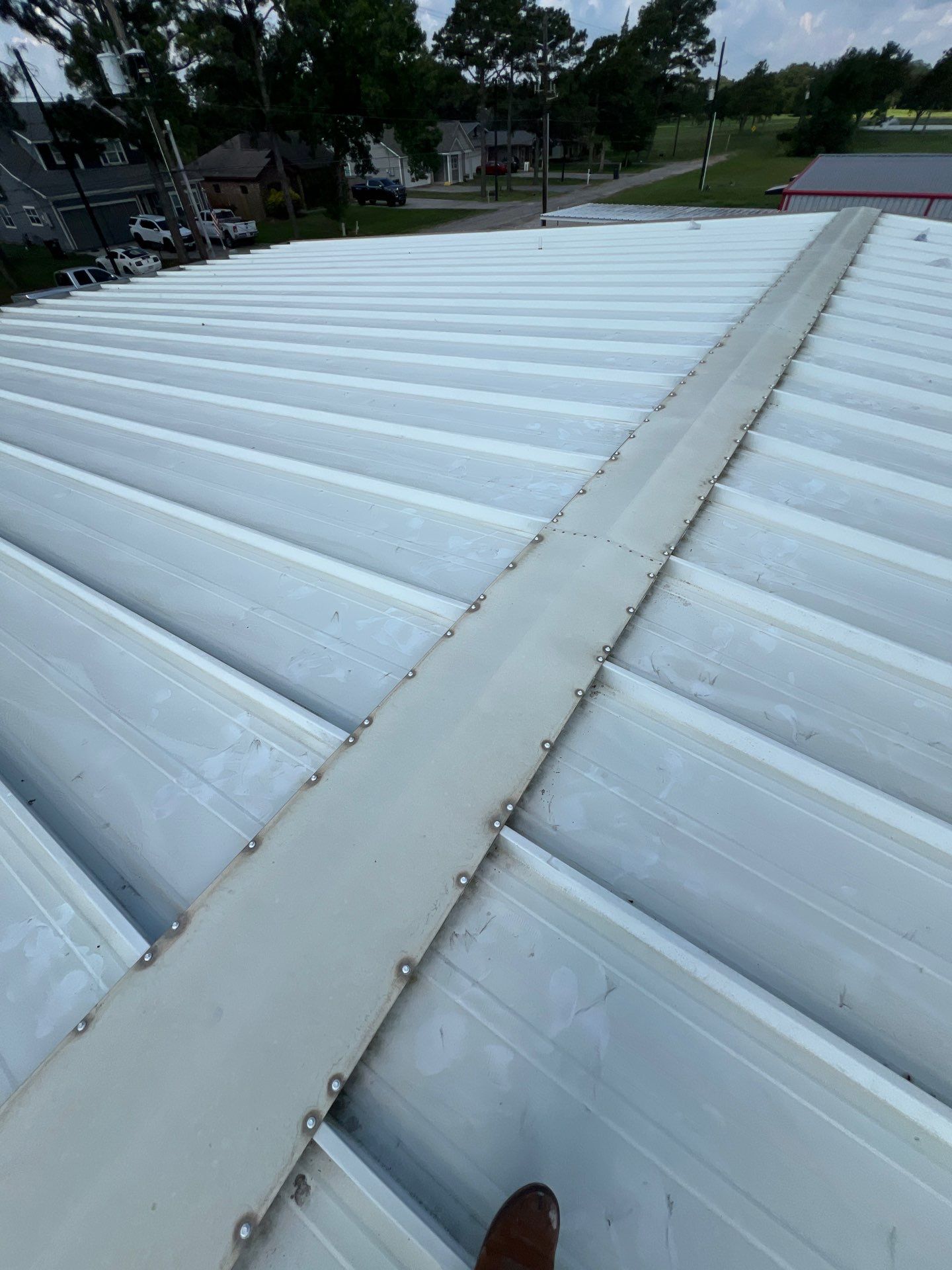 Commercial Roofing Repair using Metal by Roof Repair Company