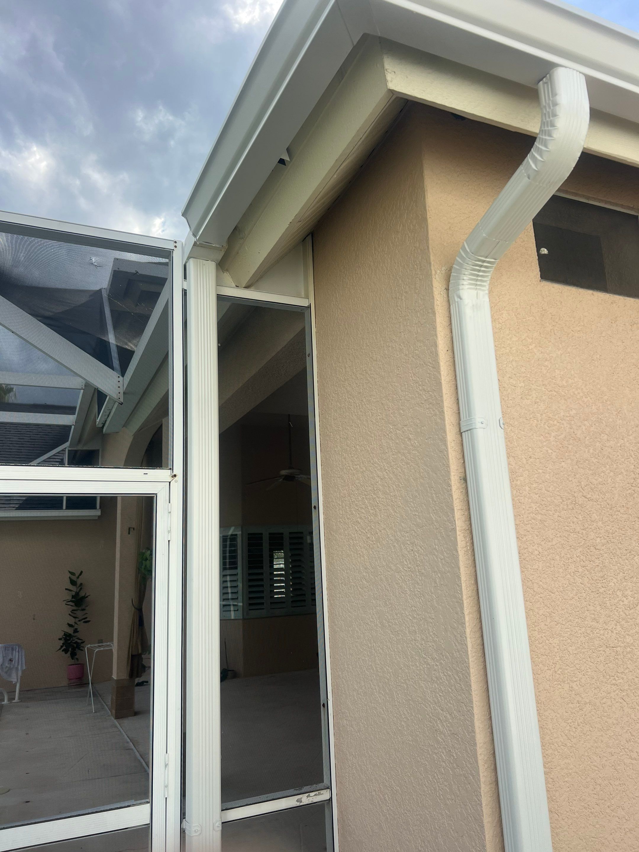 White Gutters and White Downspouts by Gutter Professors