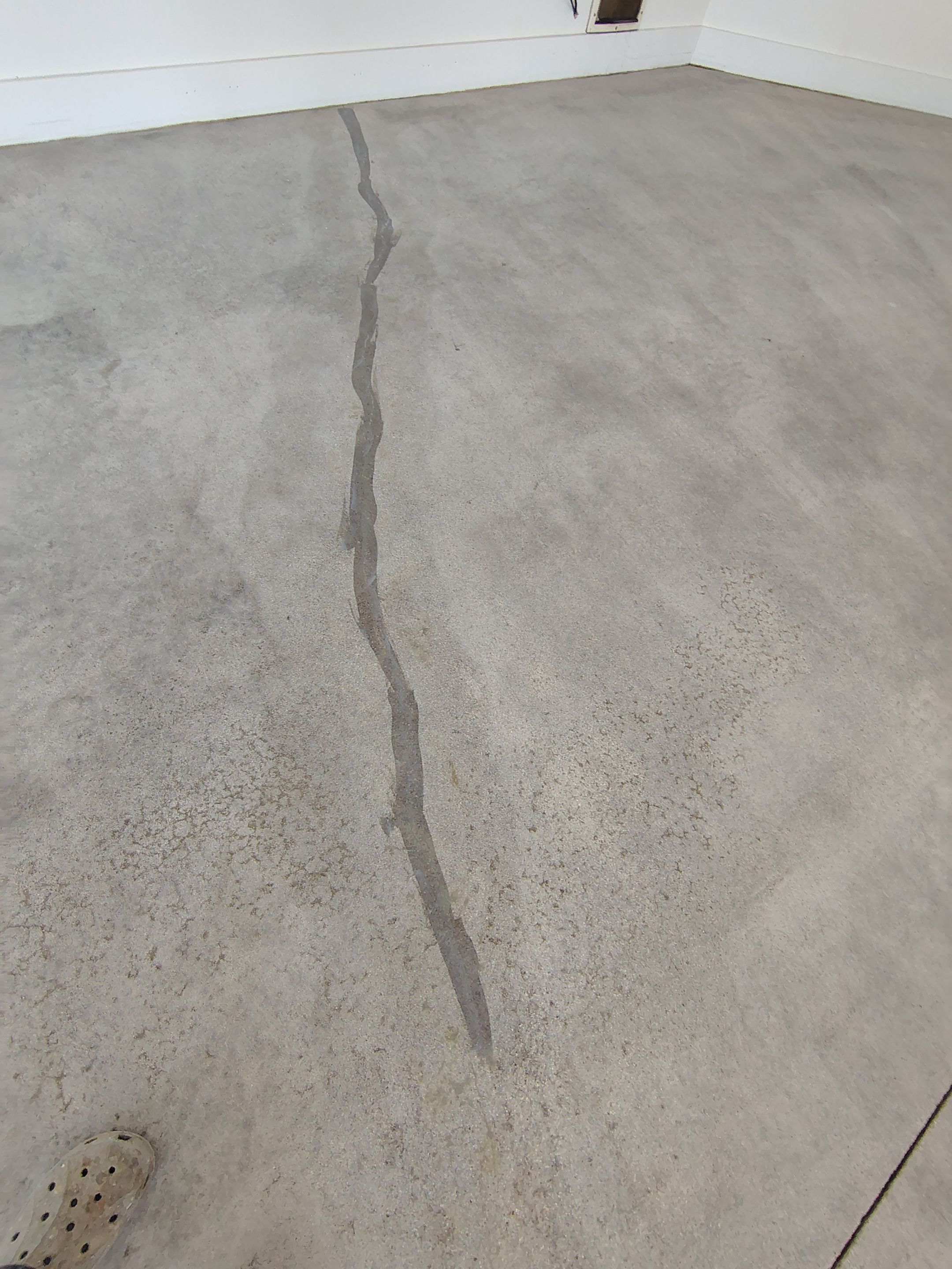 Feather Grey Floor Coating in Sioux Falls, SD by Select Painting, Coatings & Garage Cabinets