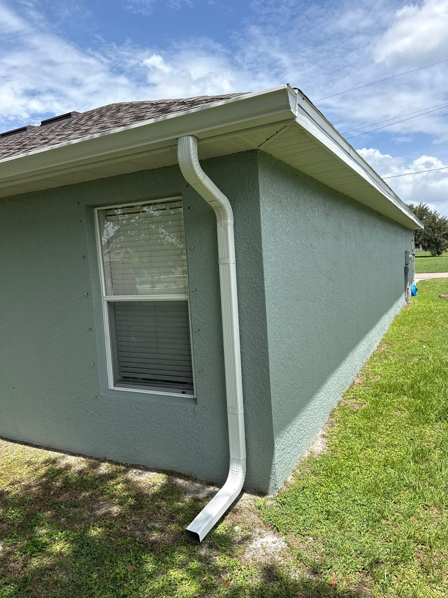 Gutter Guard and New Downspouts Installation in Punta Gorda FL by Gutter Professors