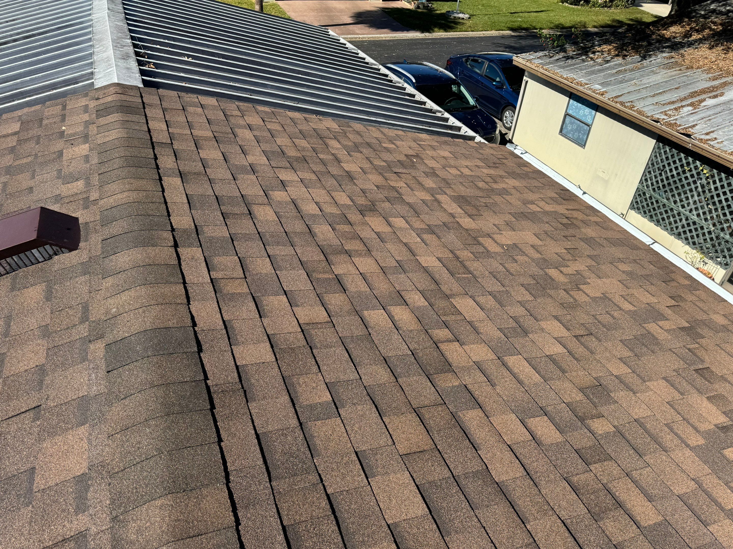 Brownwood Shingles by Reimagine Roofing