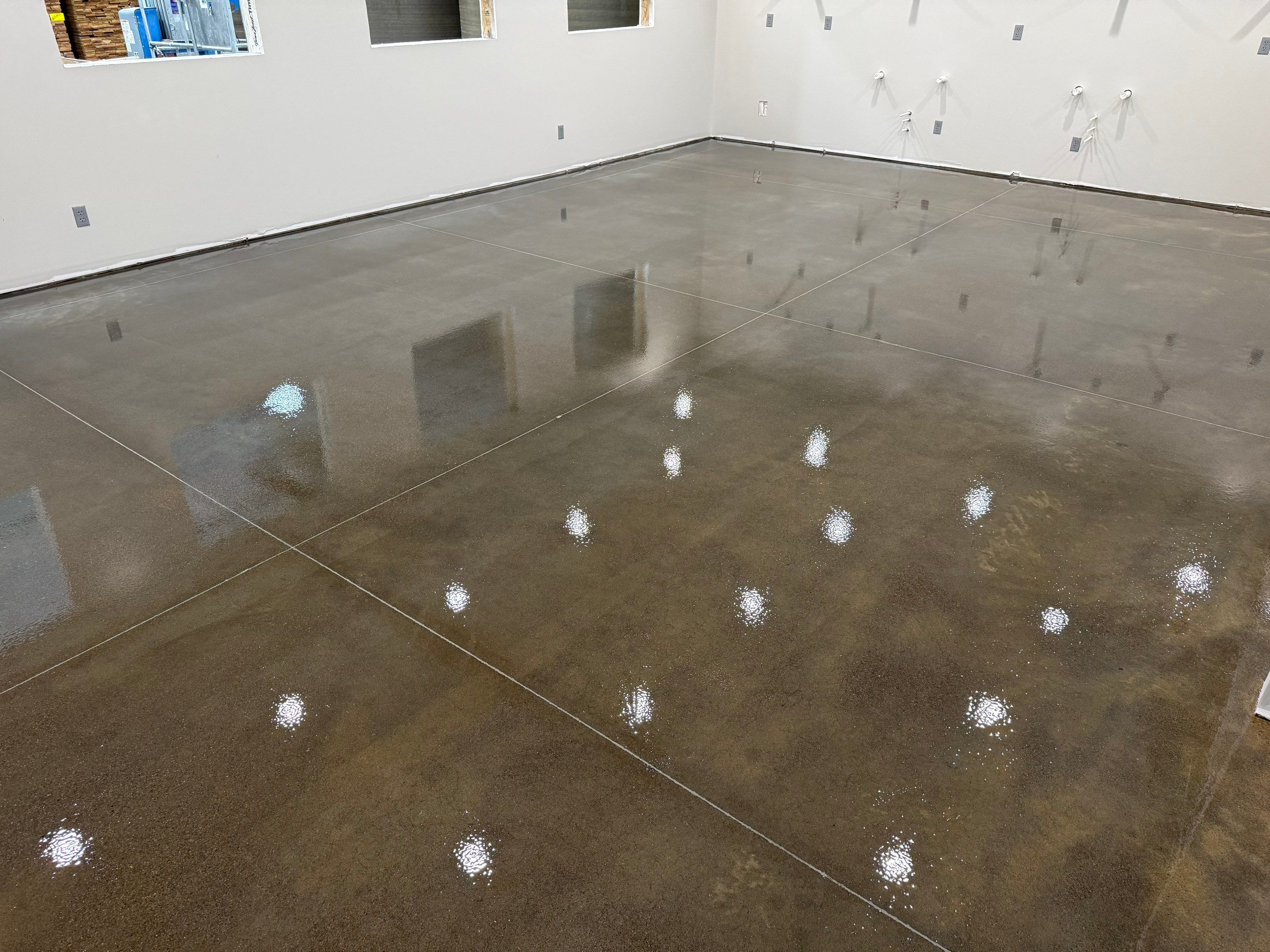 Industrial Concrete Polishing and Coating for Large Manufacturing Warehouse by Select Painting, Coatings & Garage Cabinets