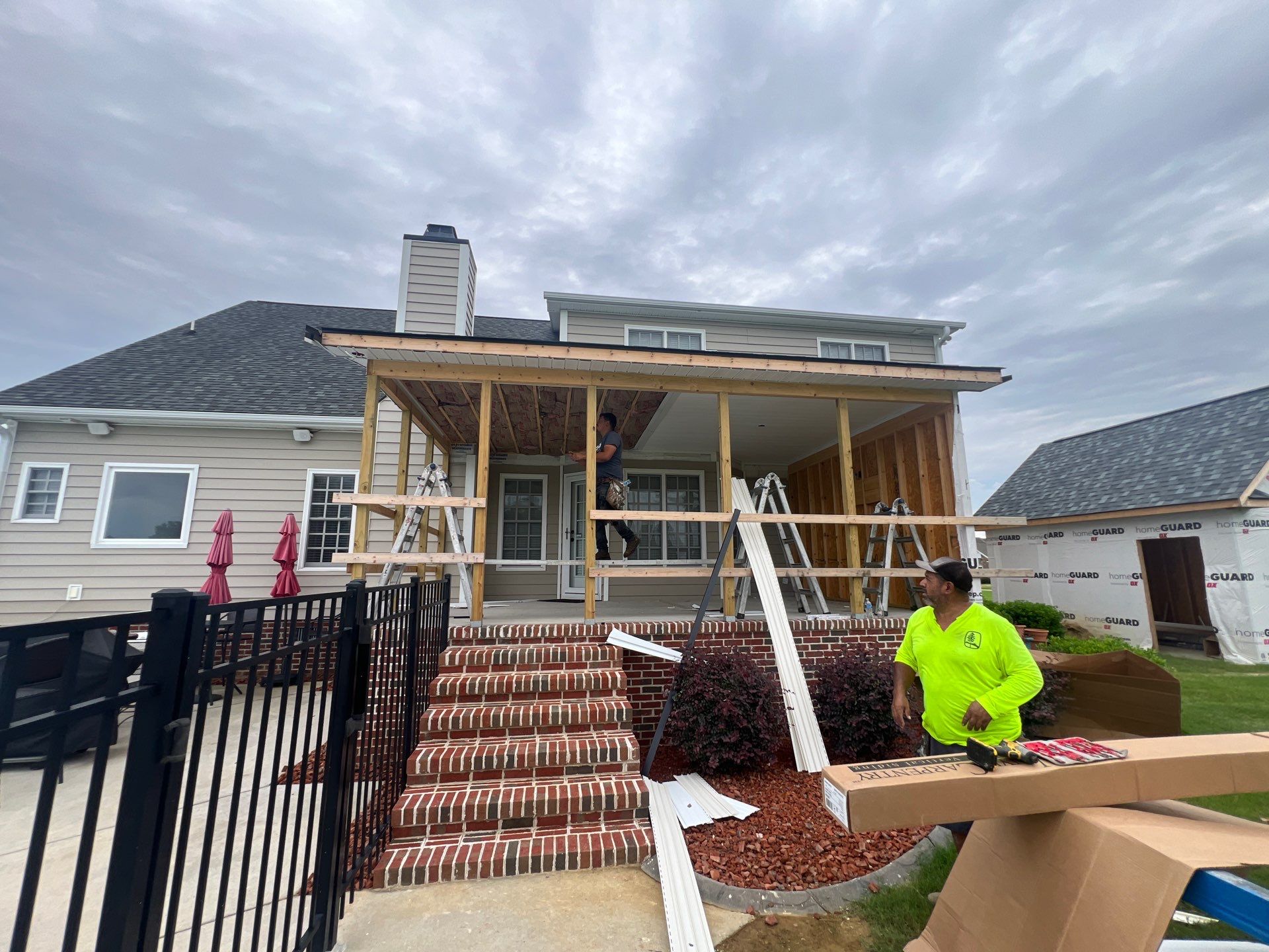 Custom Screened Porch and Concrete Walkway Installation in Rocky Mount by The Remodeling Company
