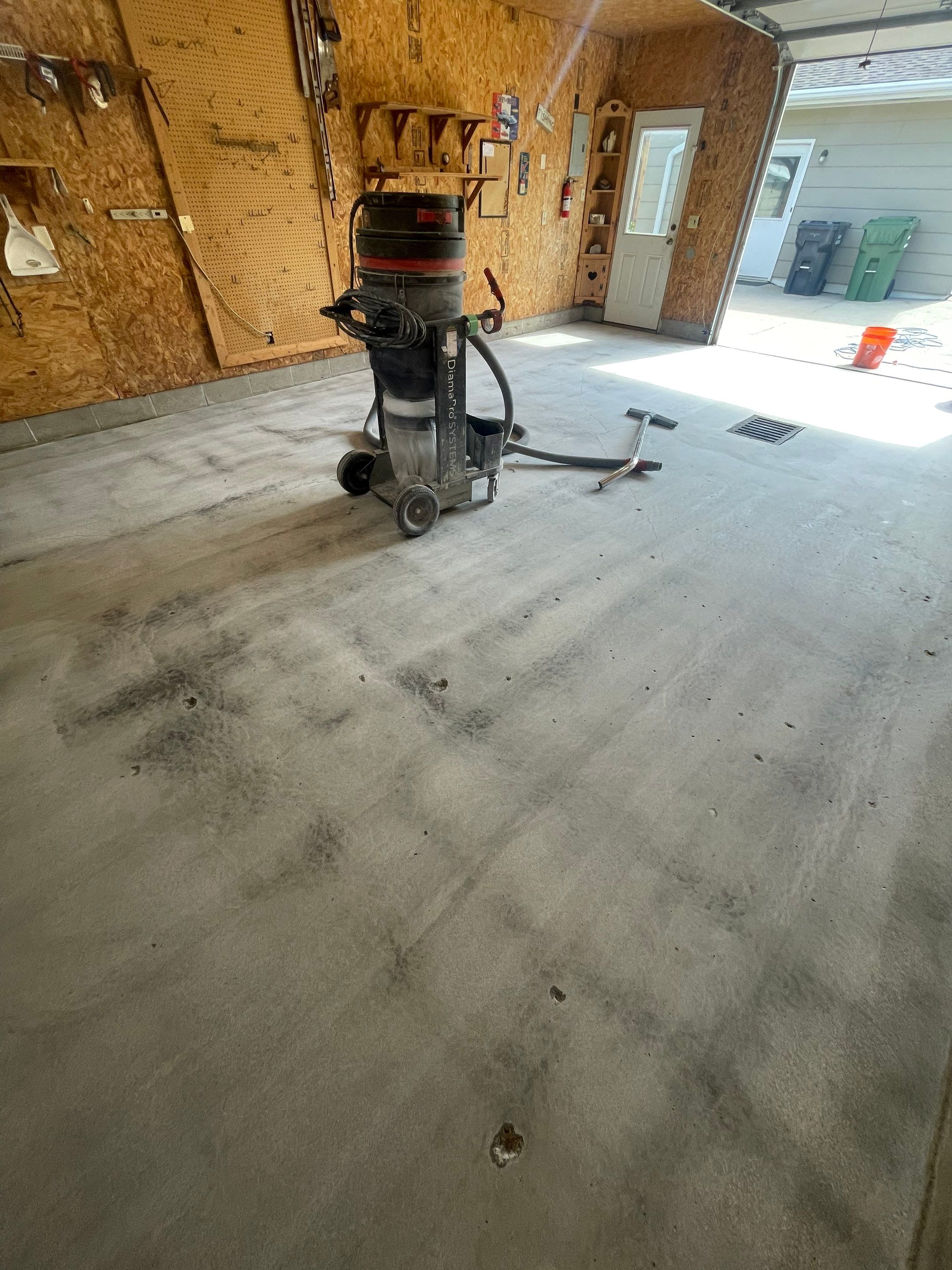 Speckled Epoxy Flake Concrete Coating for Worthington Garage Floor by Select Painting, Coatings & Garage Cabinets