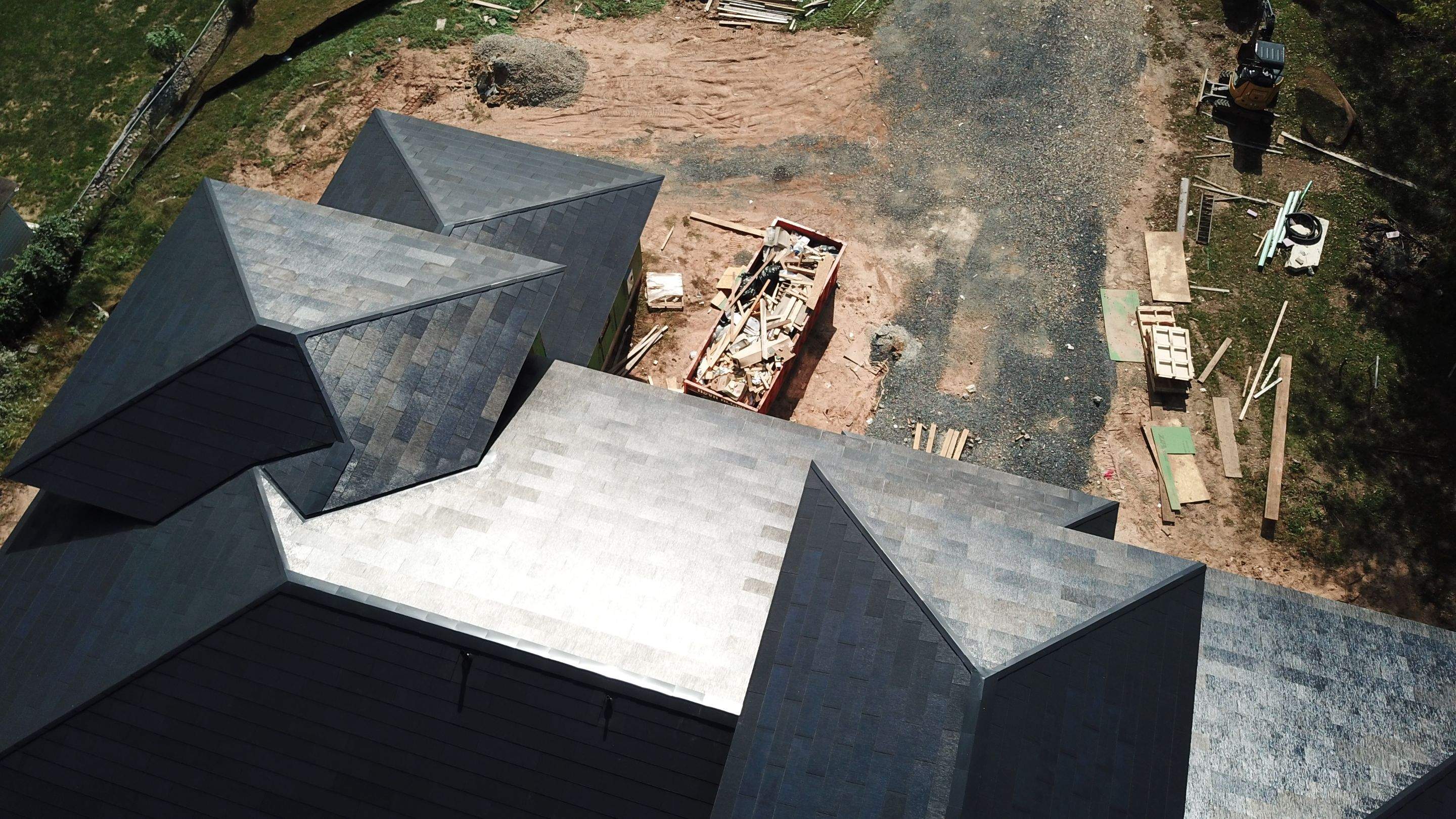 Tesla Solar Roof  using Tesla Solar Roof V3 tiles by American Home Contractors