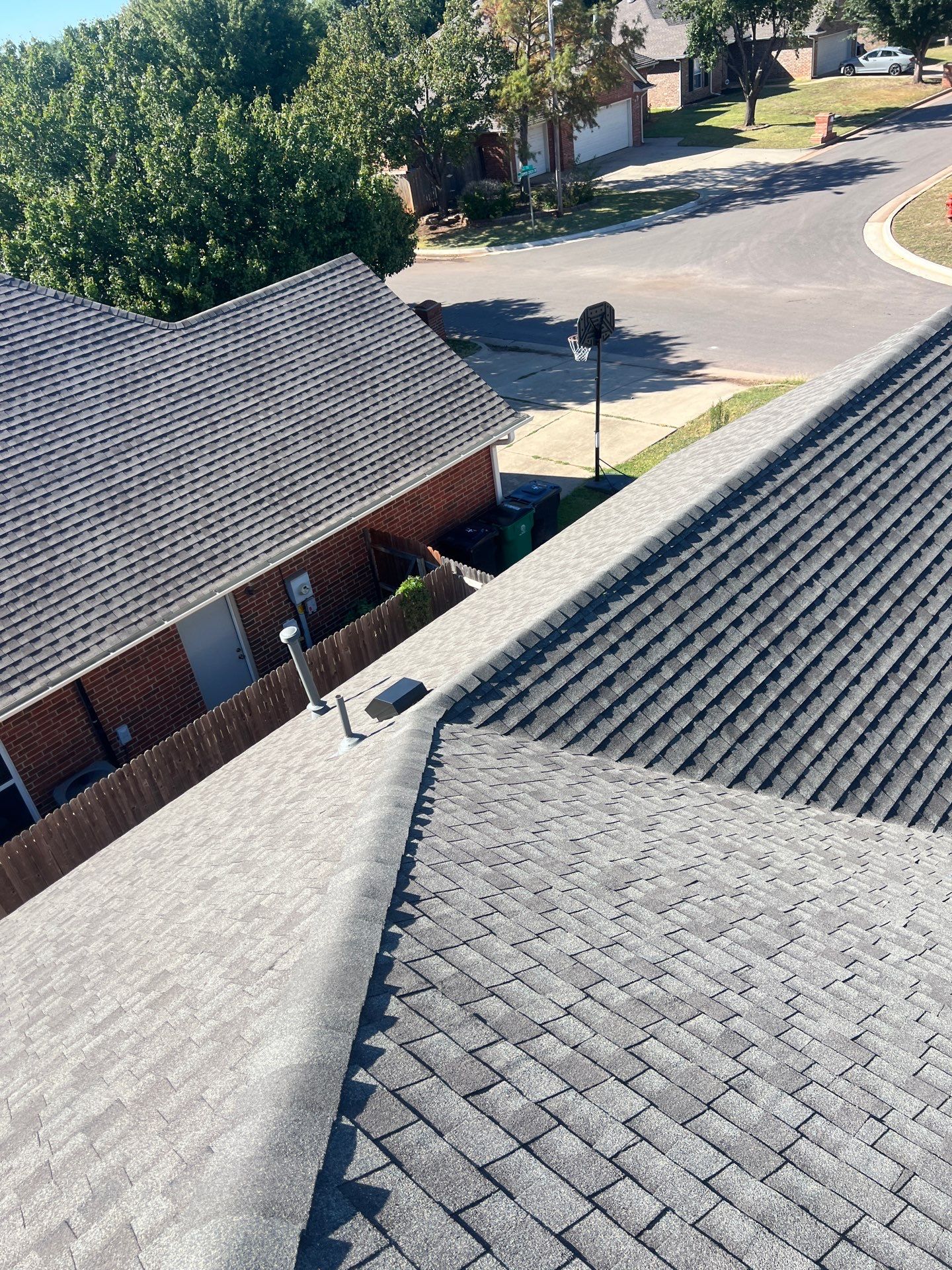 Roof Replacement and Gutter Installment in Edmond, OK by McCann's Roofing and Construction
