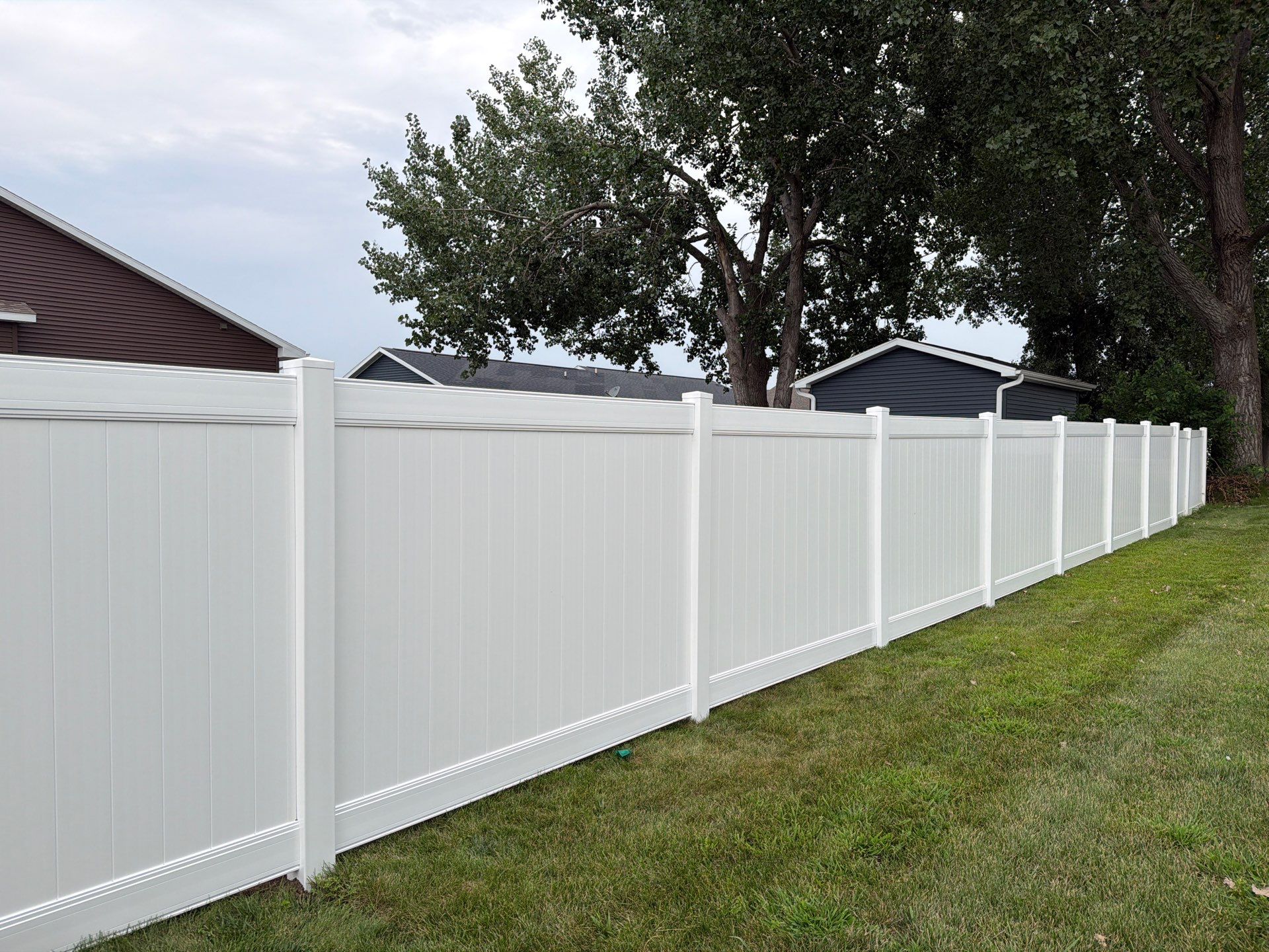 White Vinyl Privacy Fence and Double Gate Installation in Jesup by Perfect Picket Fence and Stain