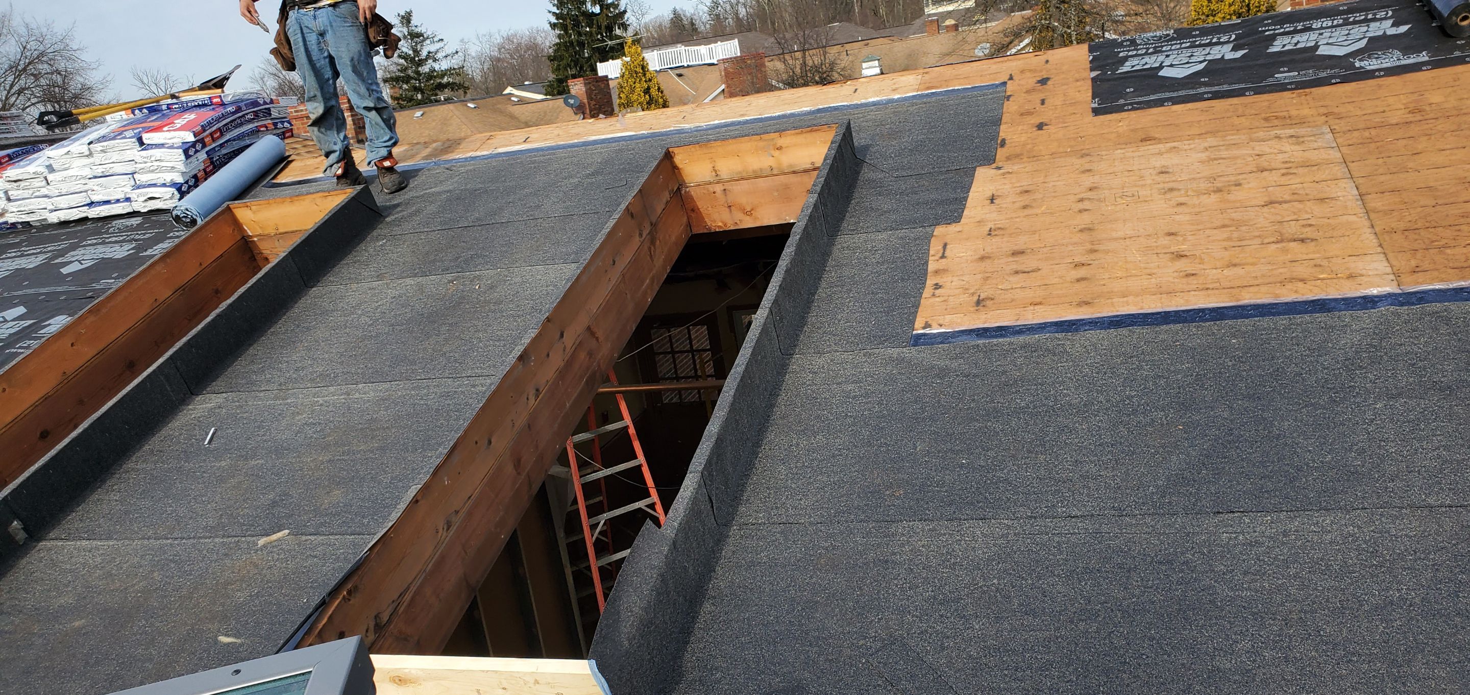 Skylight removal and install  by Absolute Roofing and Construction