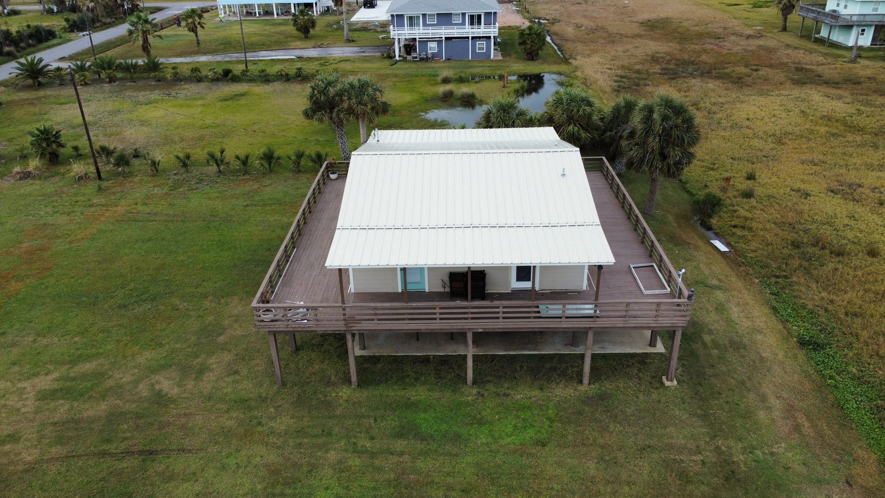 Residential Roofing Installation using R-Panel Metal Roofing on Galveston Island by Core Four Roofing