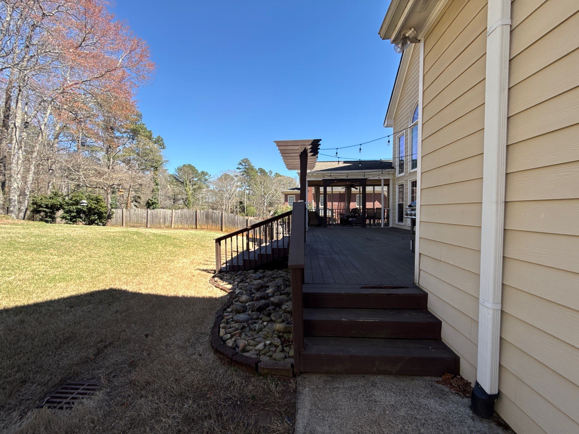 Marietta, GA Deck Replacement using Deckorators Venture Series Decking and Trex Steel Railing by Nelson Exteriors 