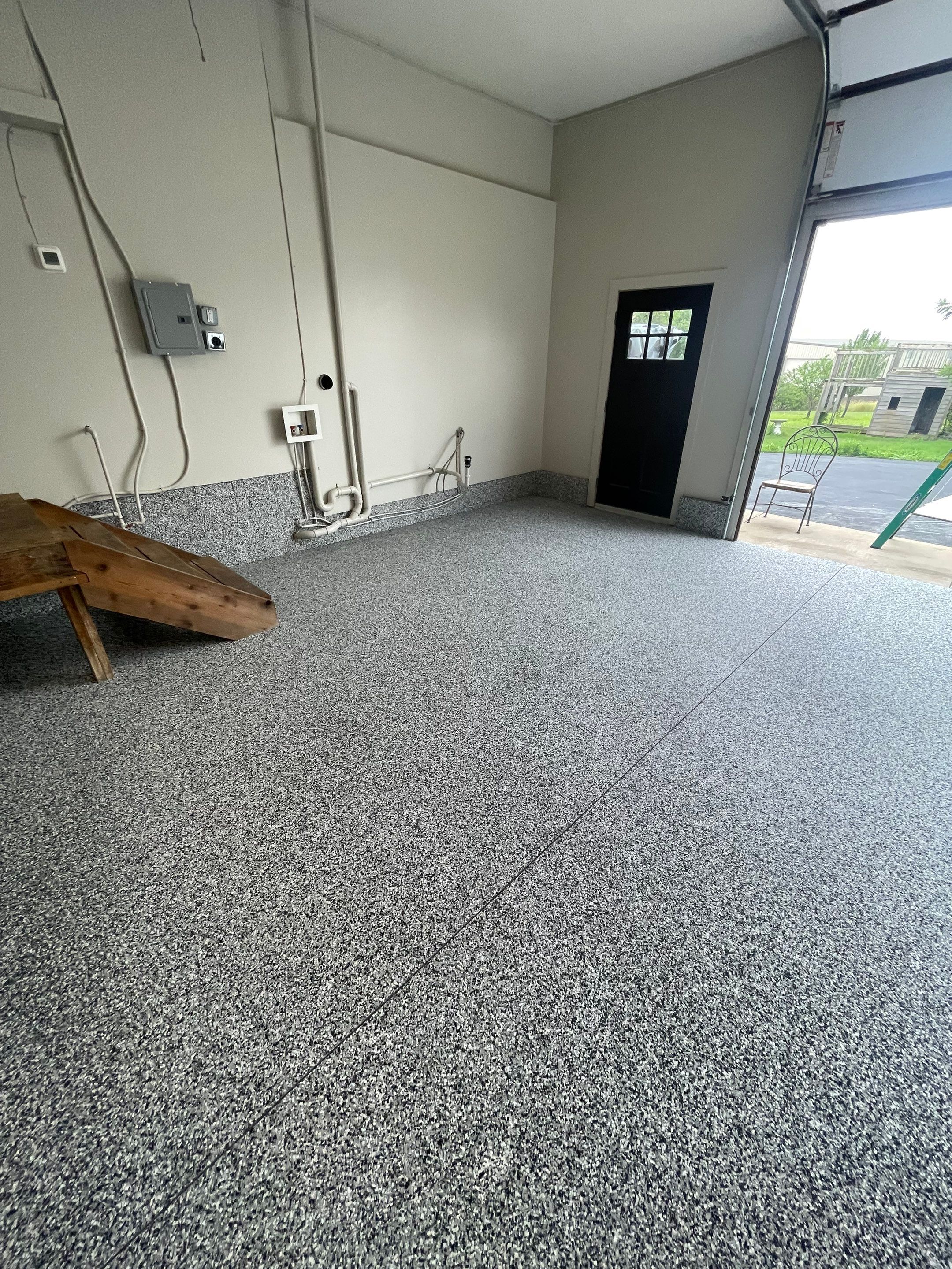 Domino Flake Floor Coating and Crack Repair in Chancellor by Select Painting, Coatings & Garage Cabinets
