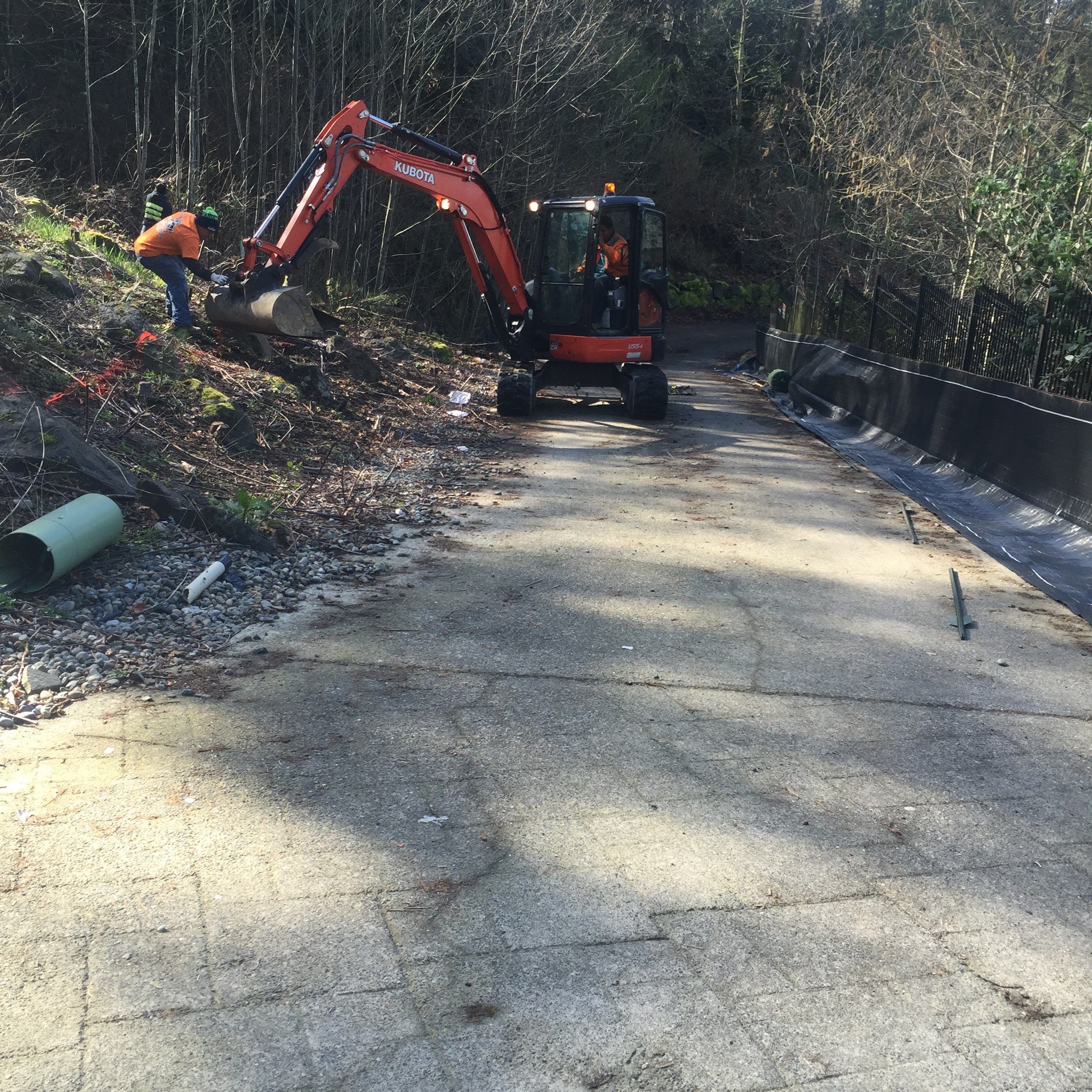 Asphalt Driveway and Stamped Concrete Patio Finish  by Jireh Asphalt & Concrete Inc 