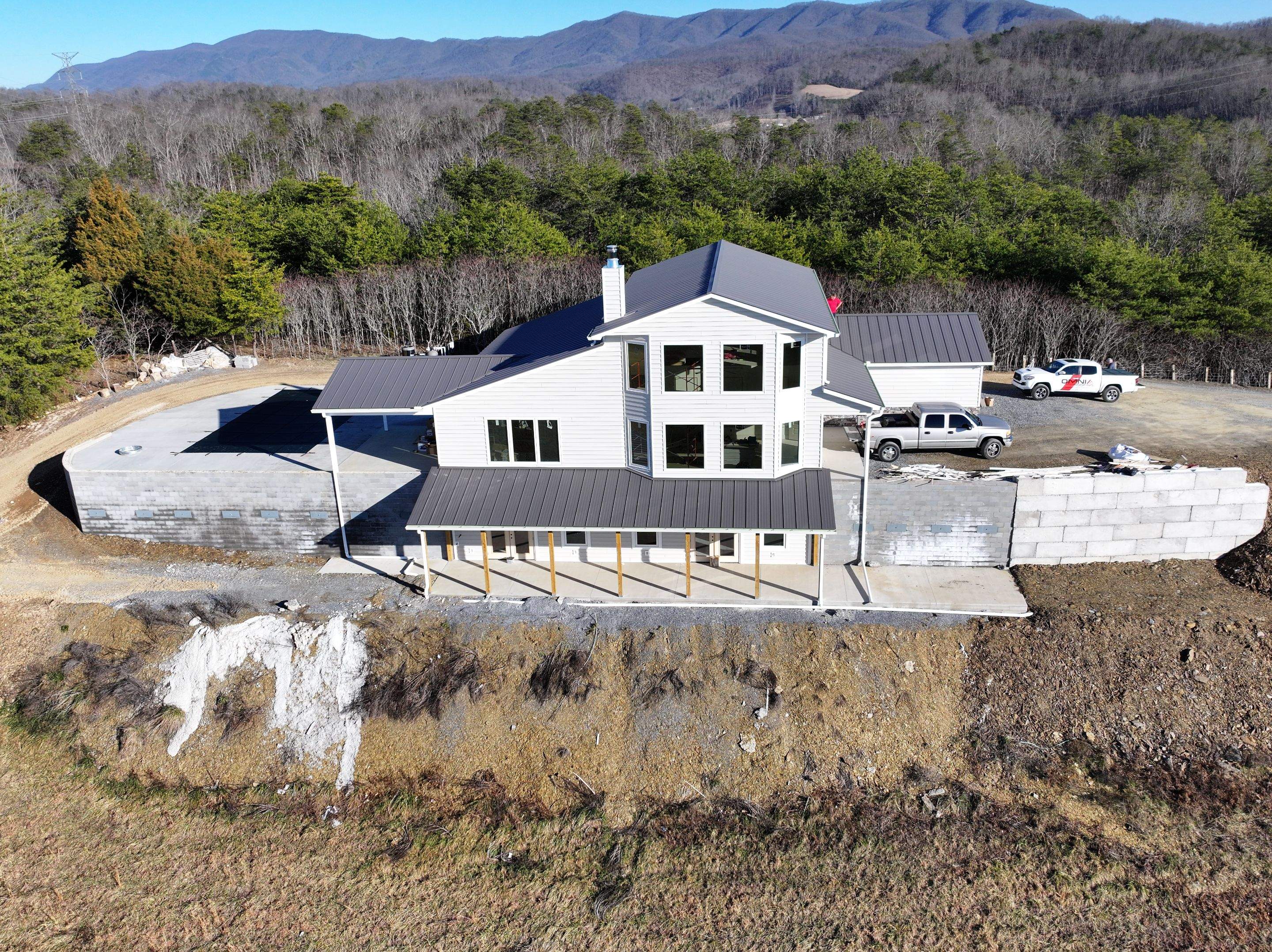 Textured Charcoal Gray Standing Seam by Omnia Roofing