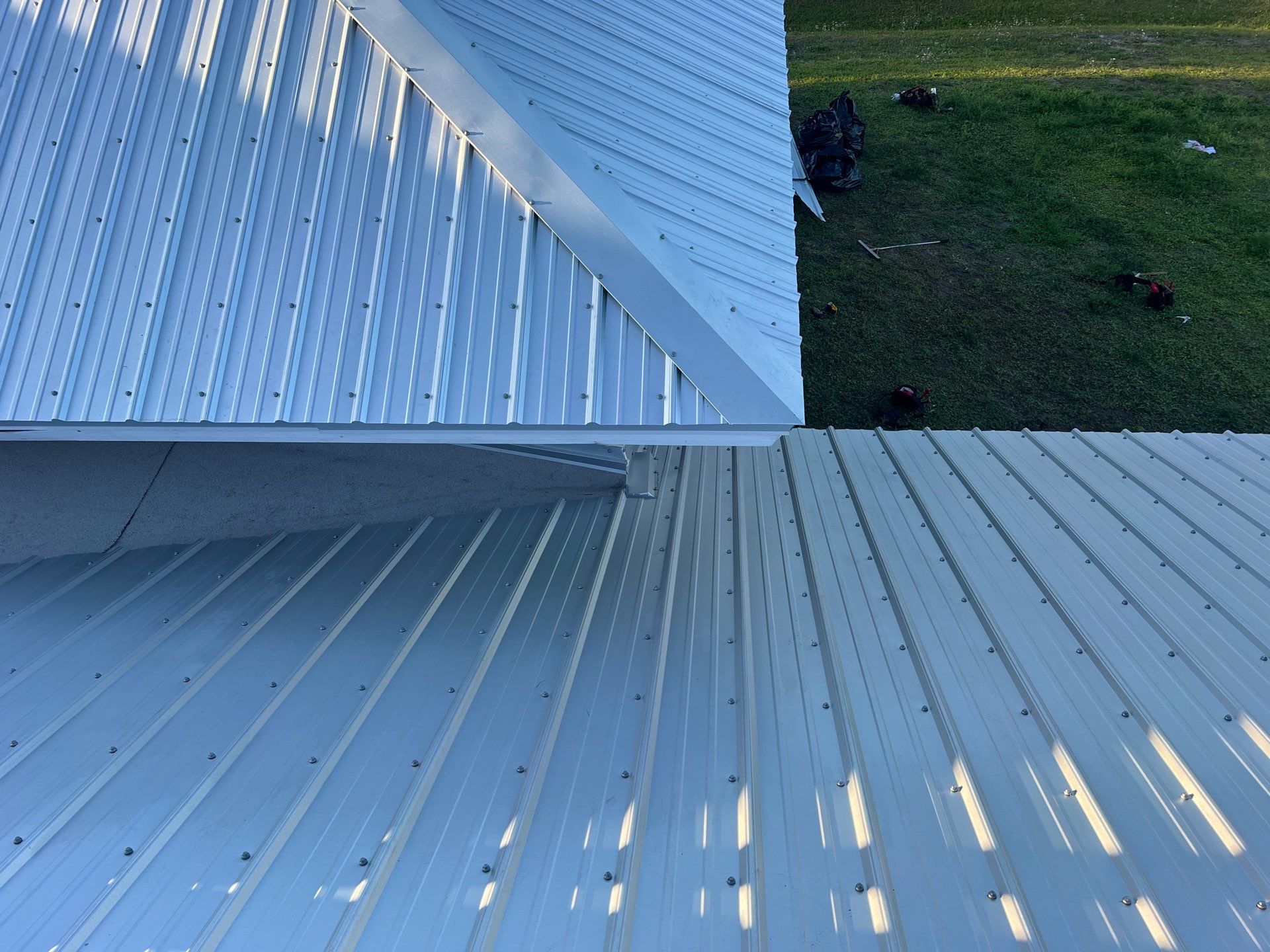 Residential Roofing Installation using Durabull Classic Rib Panel by Durabilis Roofing INC