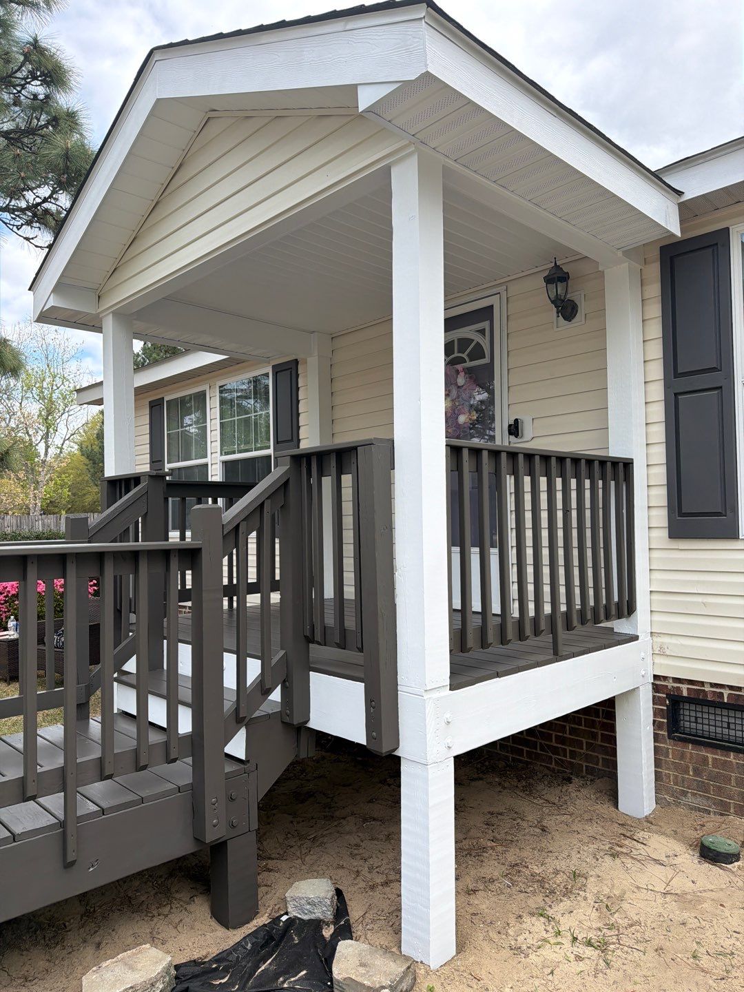 Full Roof Replacement and Custom Front Porch Addition in Pinebluff by The Remodeling Company