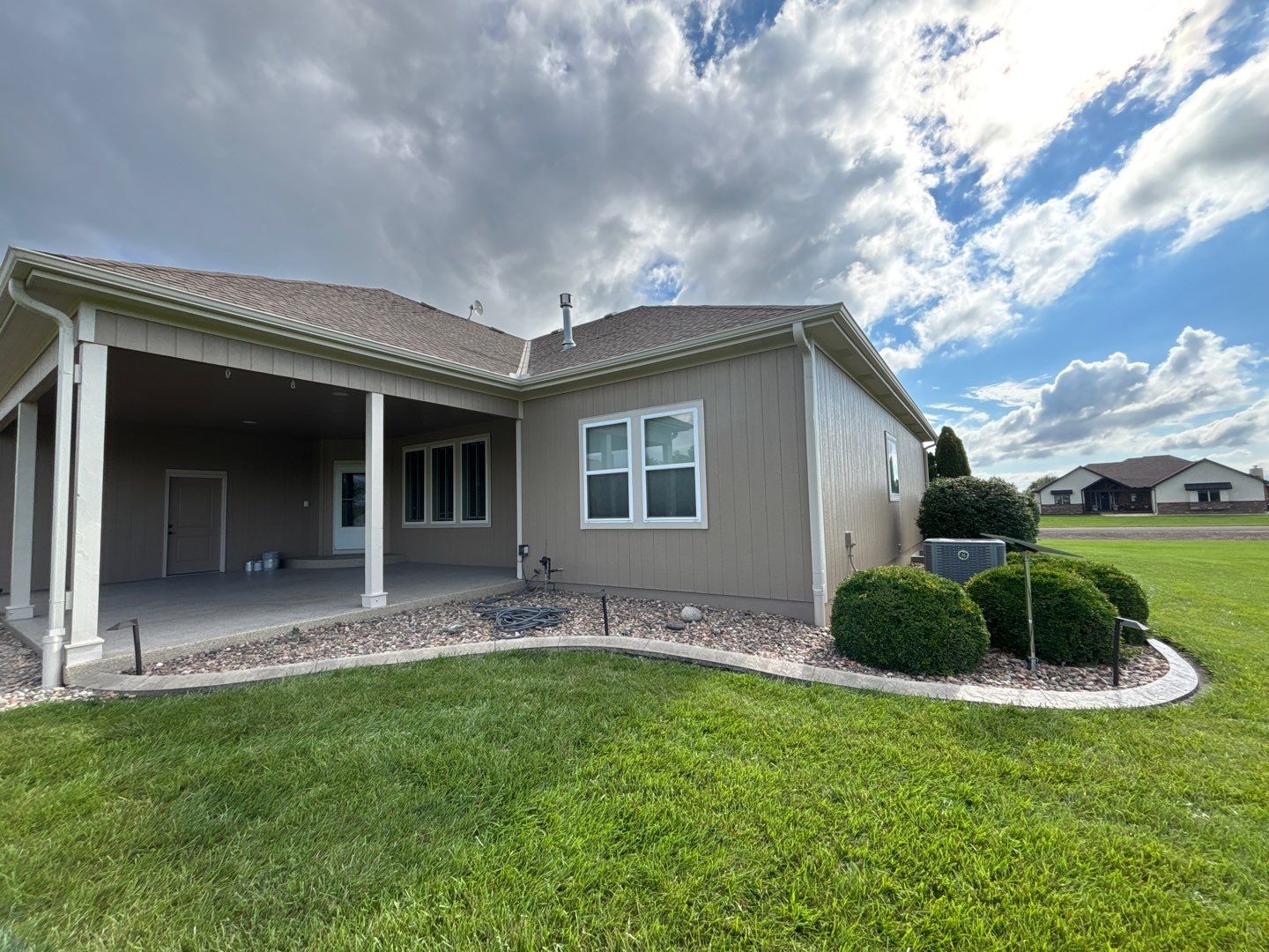 Exterior Painting and Wood Rot Repair for Wellsville Residence by Cougar Painting