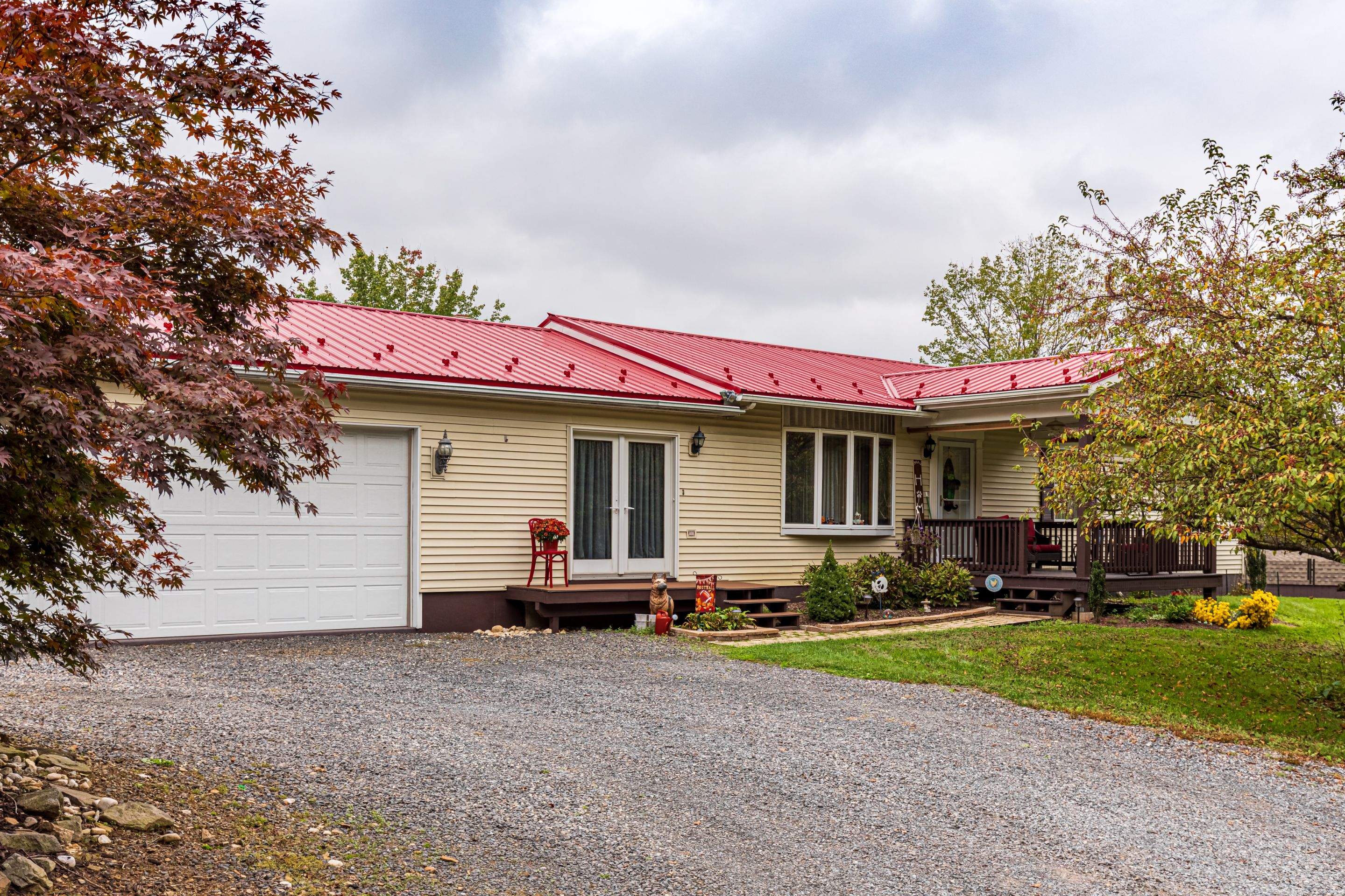 Metal Roof-scarlet red by Esh Builders