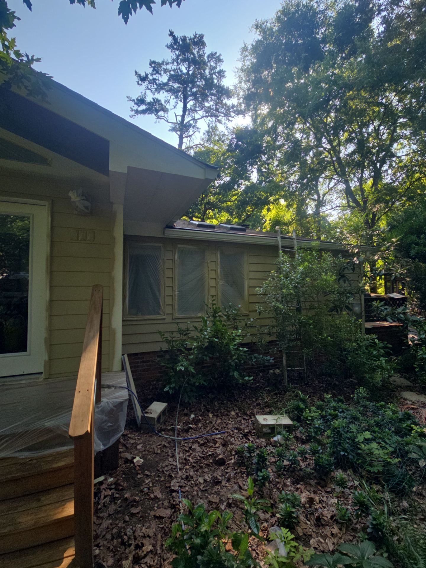 Siding replacement, exterior painting, and front door staining. by GonzalezPainters & Contractors Inc