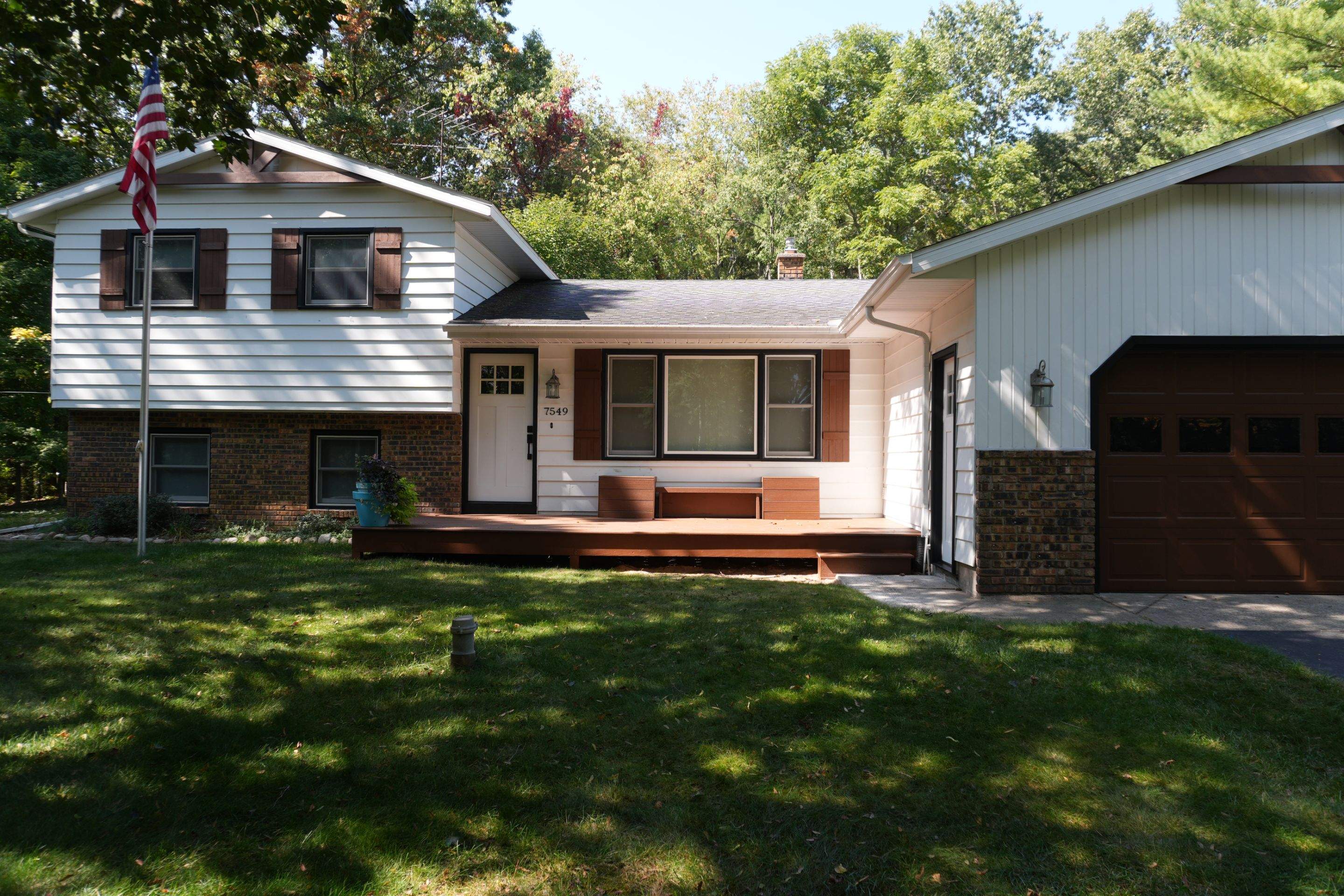Exterior Remodel & Custom Deck by Cutting Edge Homes